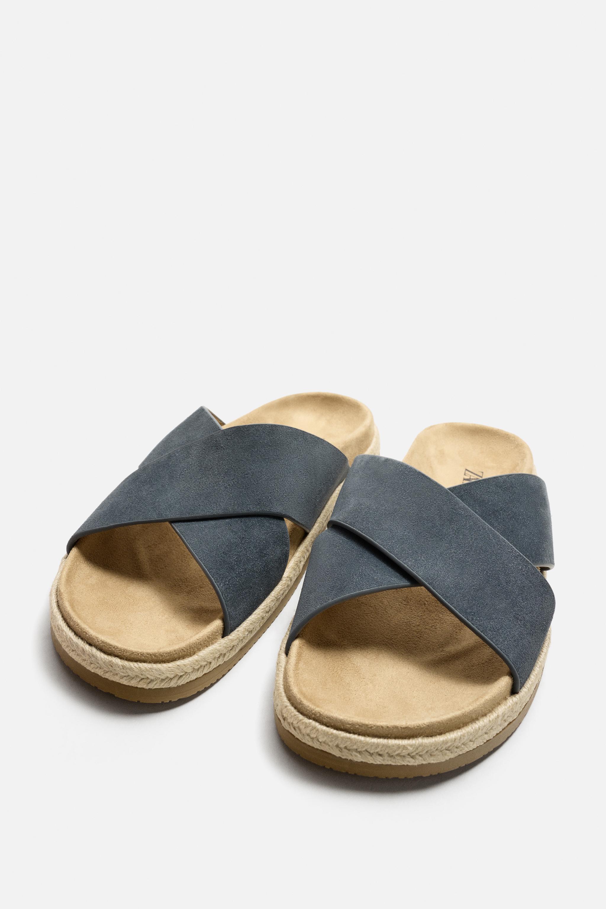 CROSSED LEATHER SANDALS