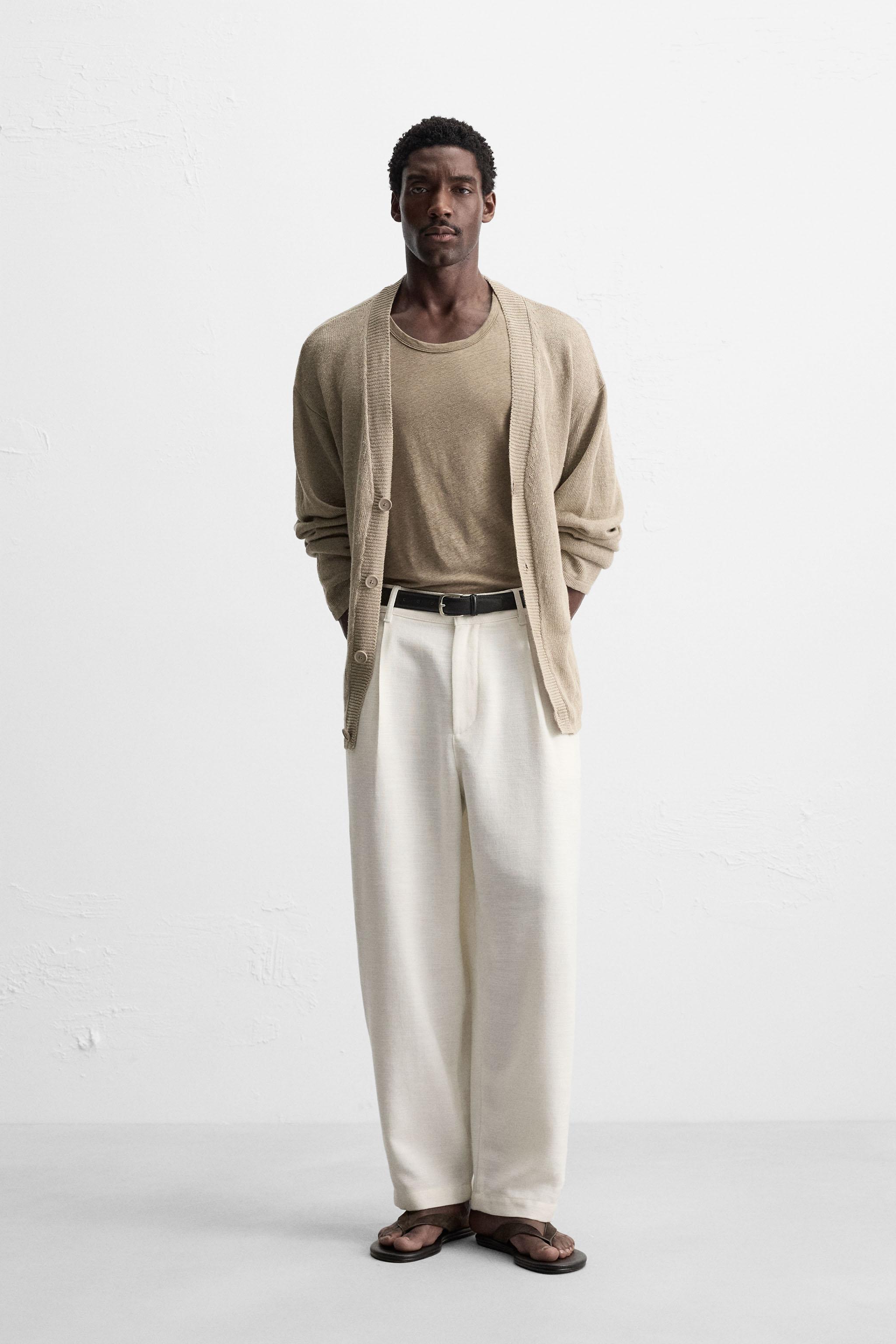 PLEATED RELAXED FIT PANTS