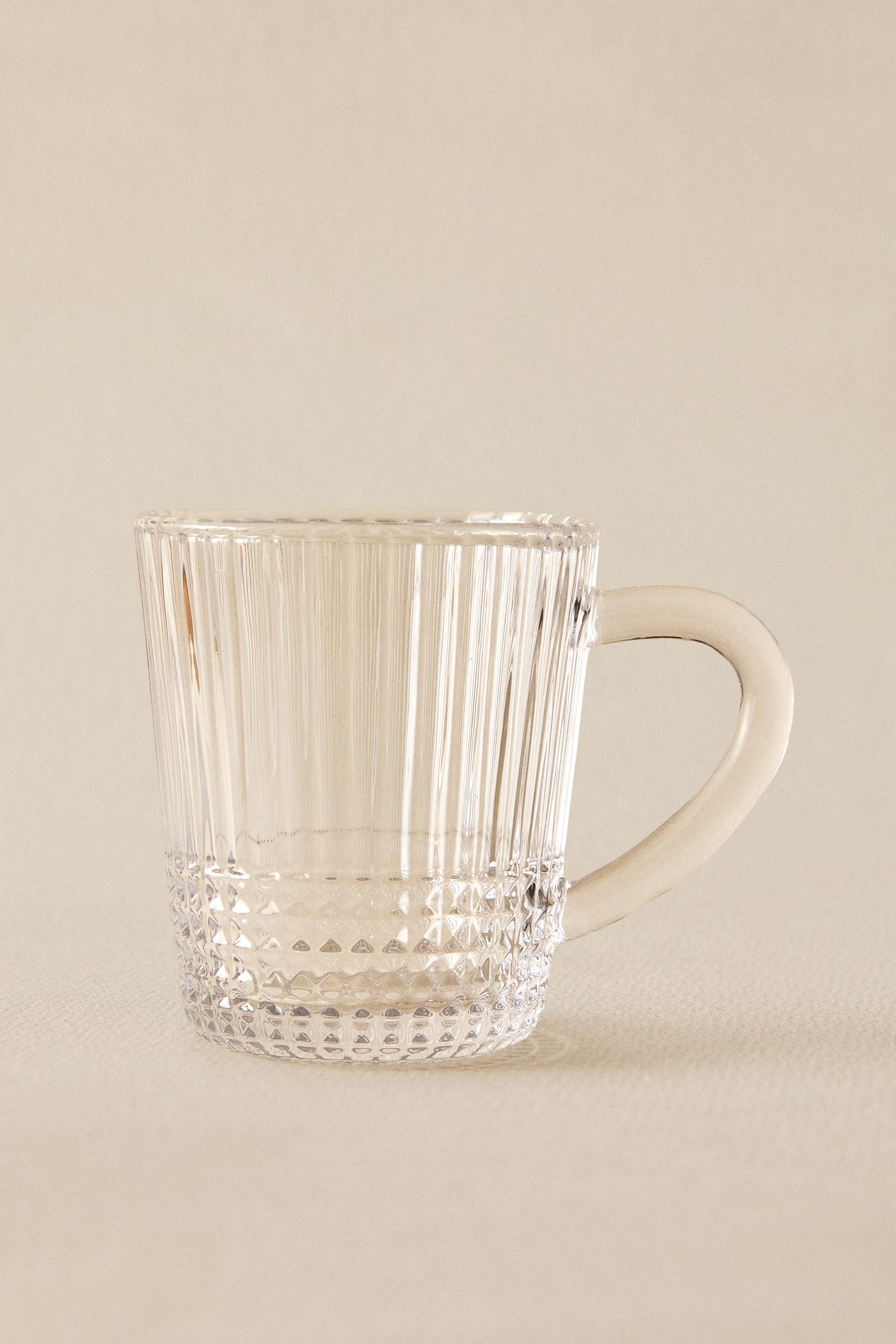 GLASS MUG WITH A RAISED GEOMETRIC DESIGN