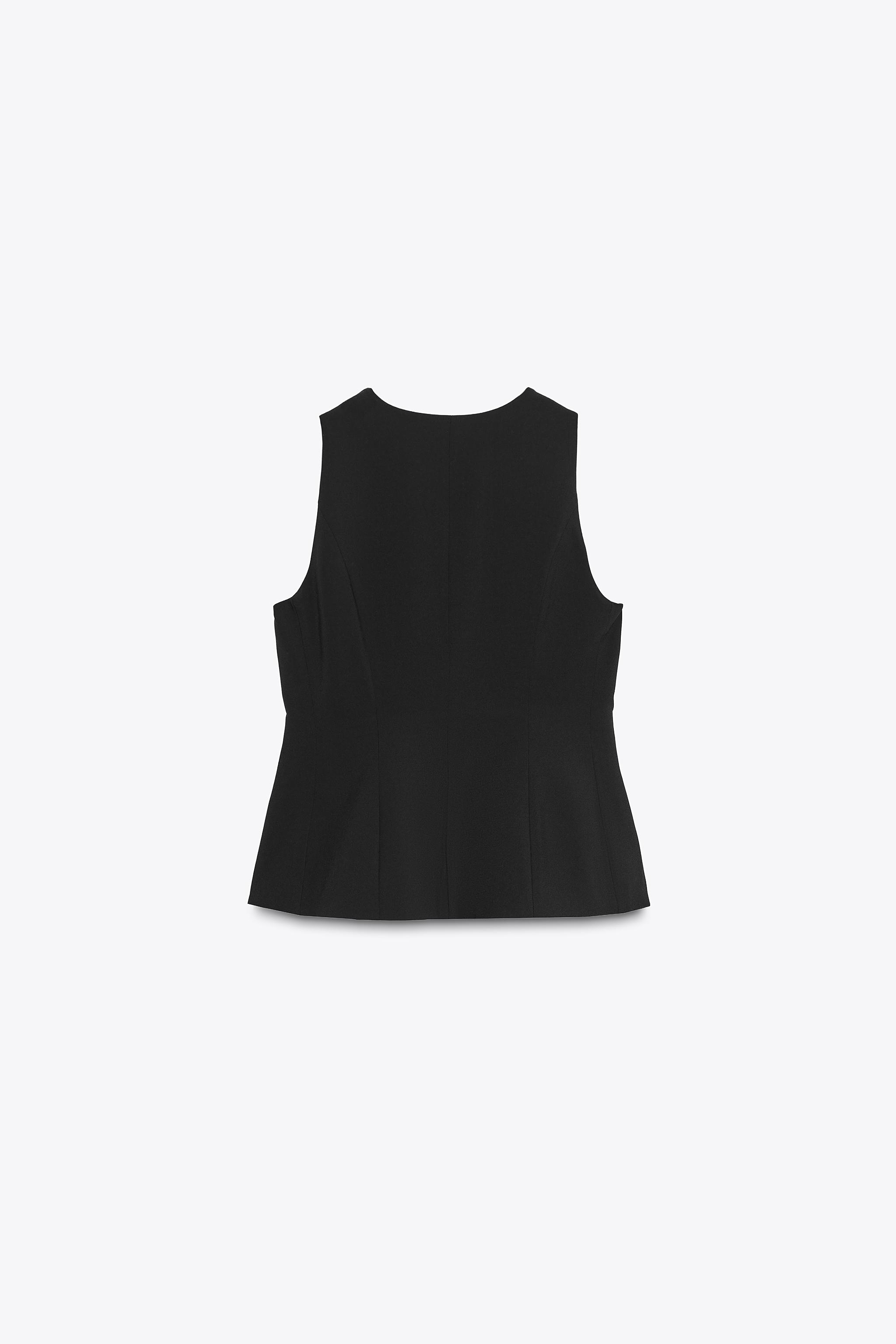 FITTED PEPLUM VEST