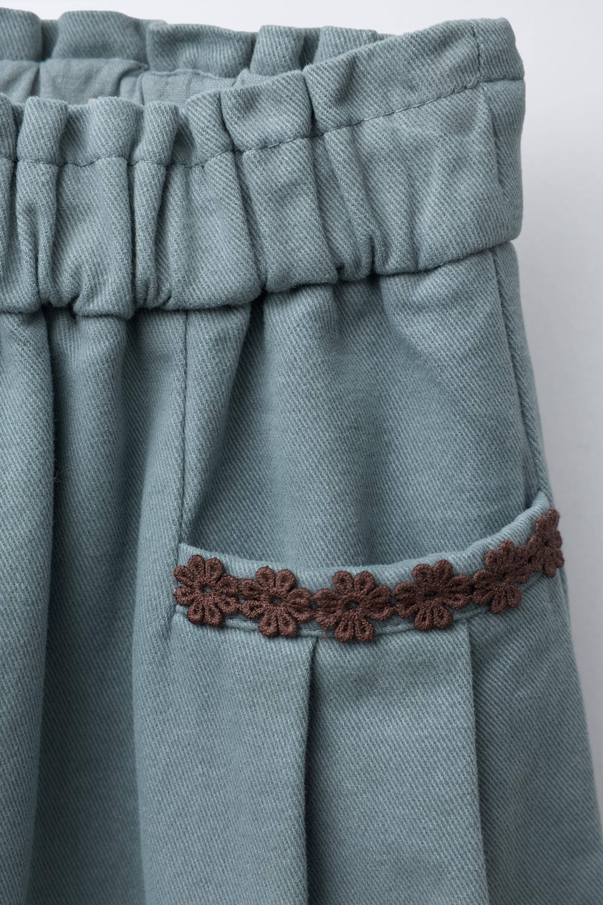 EMBROIDERED POCKET PANTS