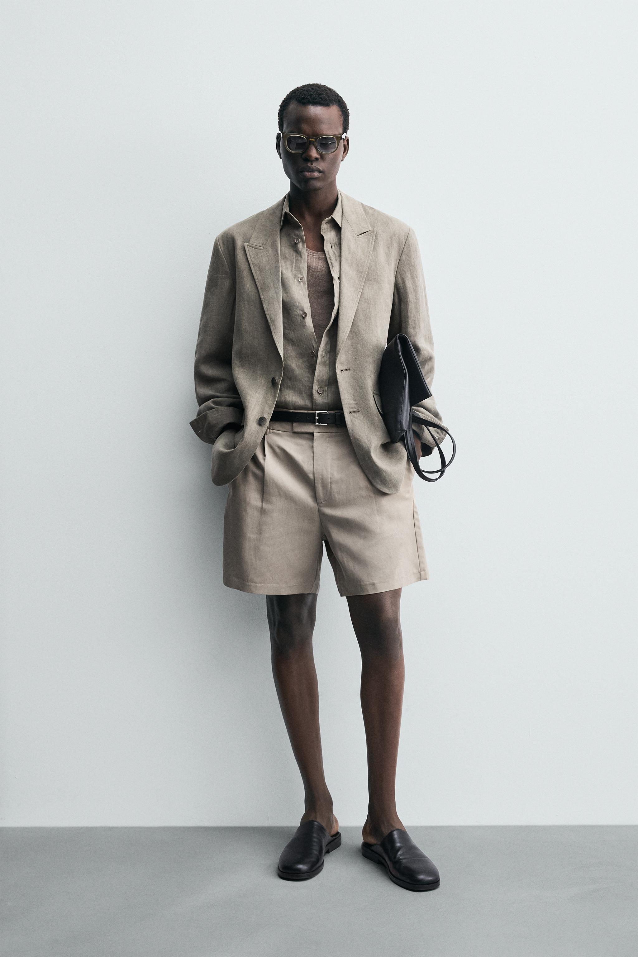 RELAXED FIT PLEATED SHORTS