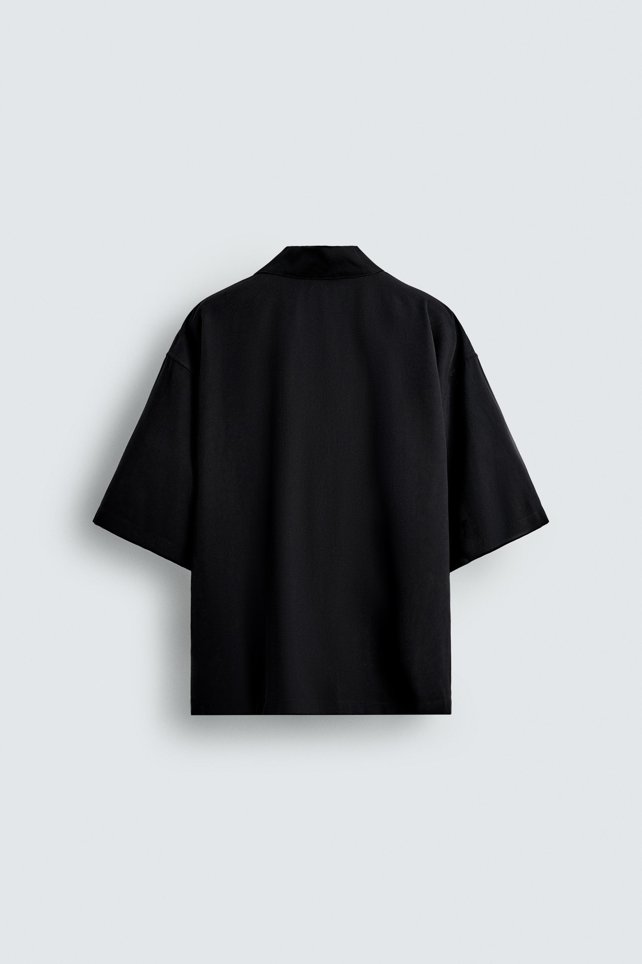 FLOWY SHIRT WITH EMBROIDERED TEXT