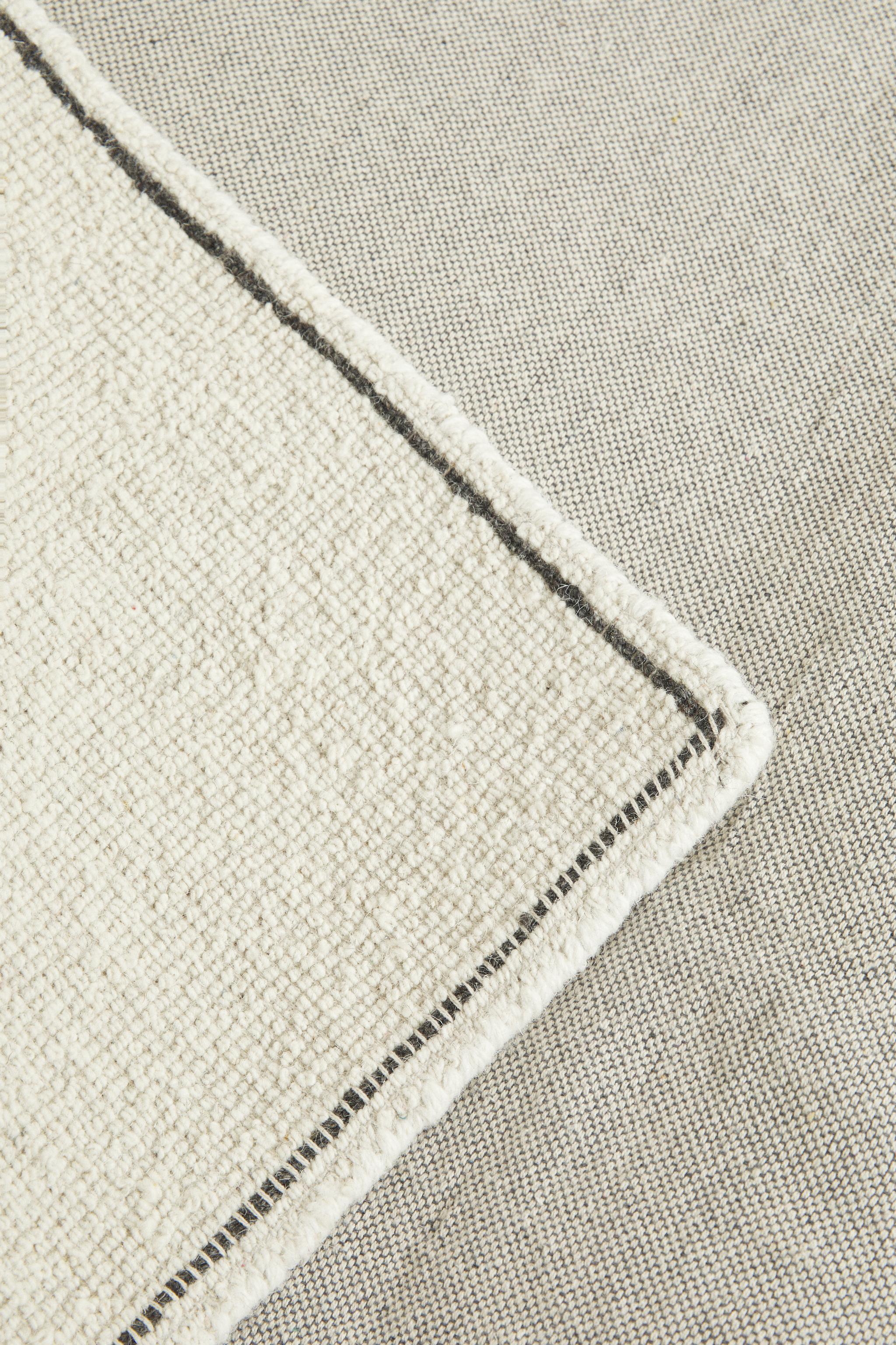 RECTANGULAR BOUCLÉ WOOL AREA RUG