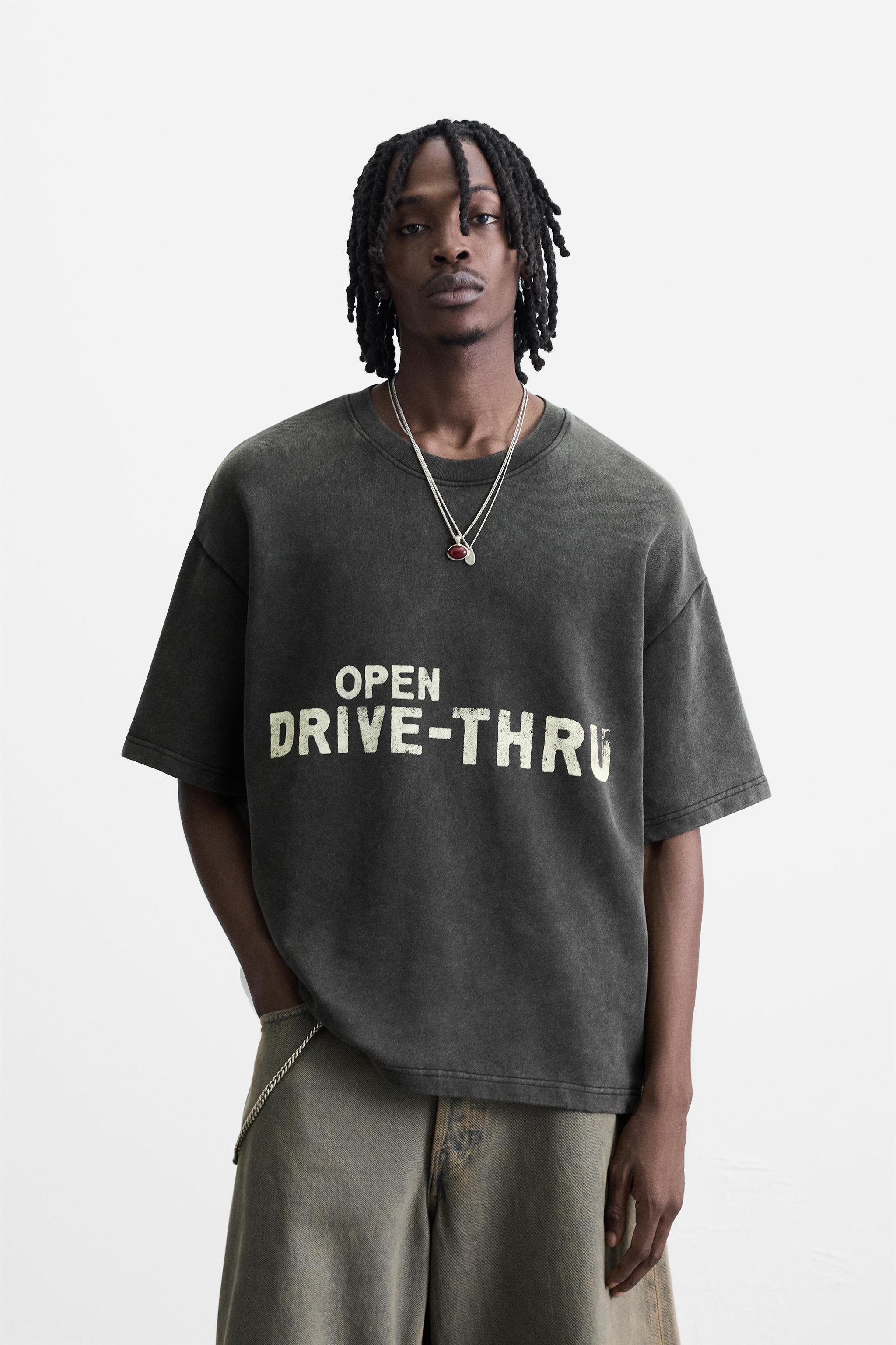 WASHED SWEATSHIRT WITH GRAPHIC PRINTS