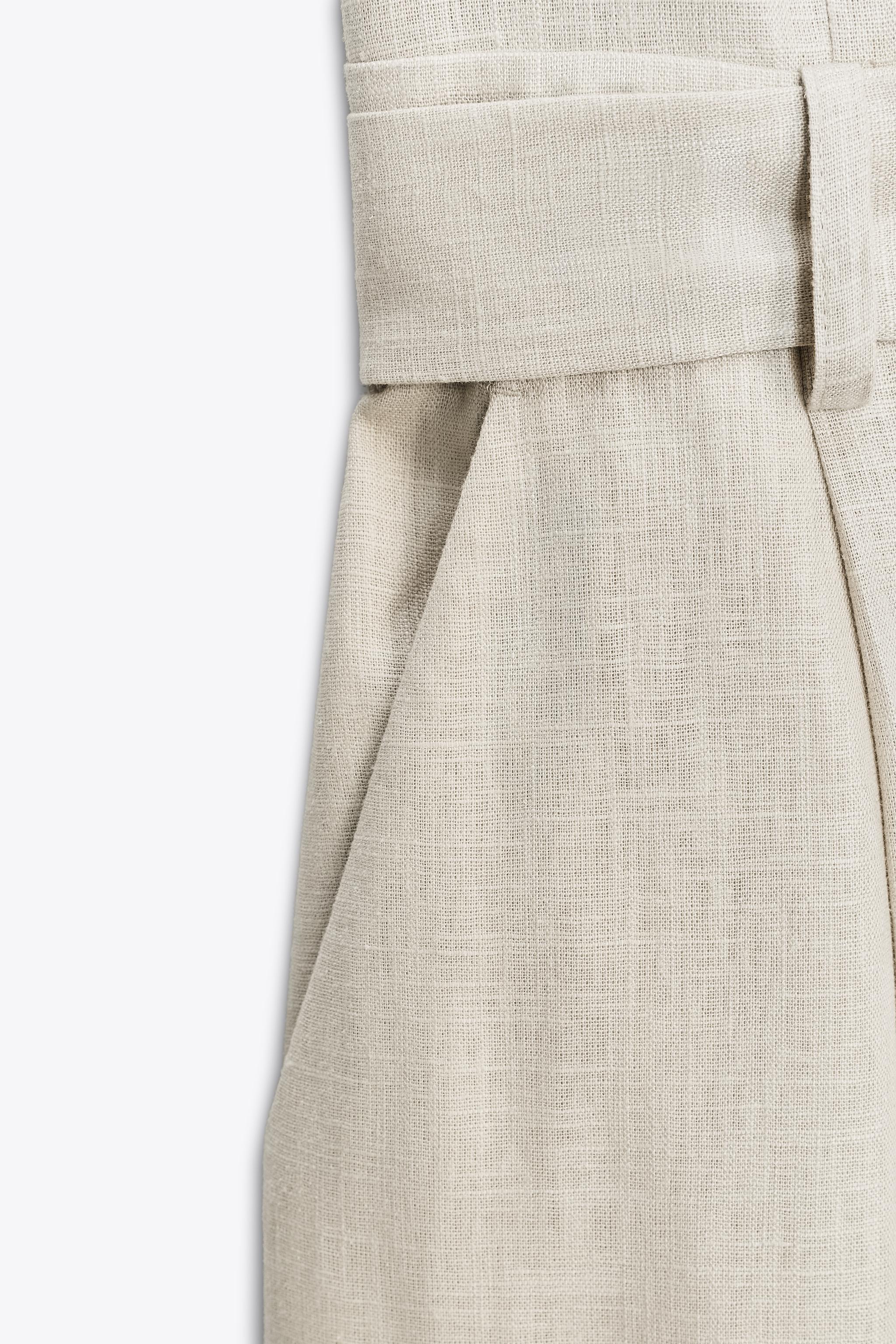 HALTER LINEN BELTED JUMPSUIT