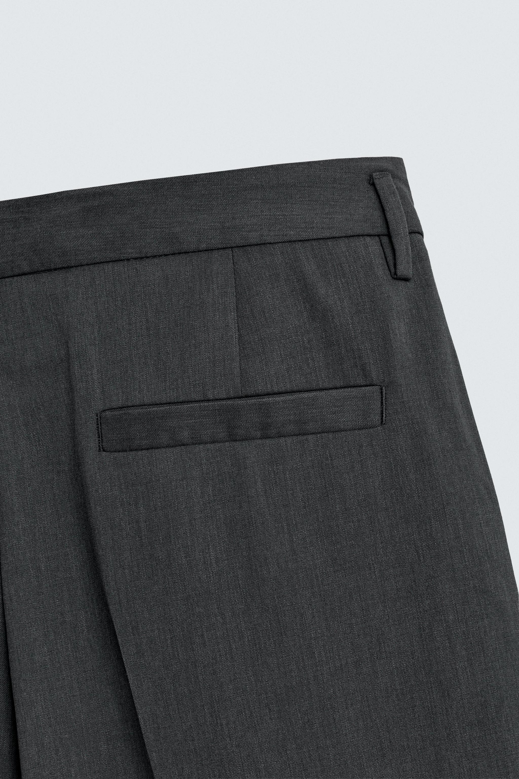 PLEATED SUIT PANTS