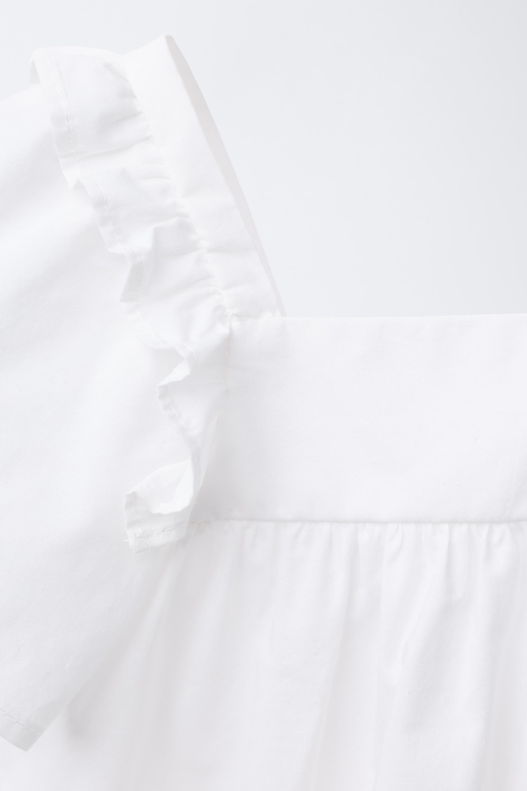 CROSS-STITCH FLORAL TOP