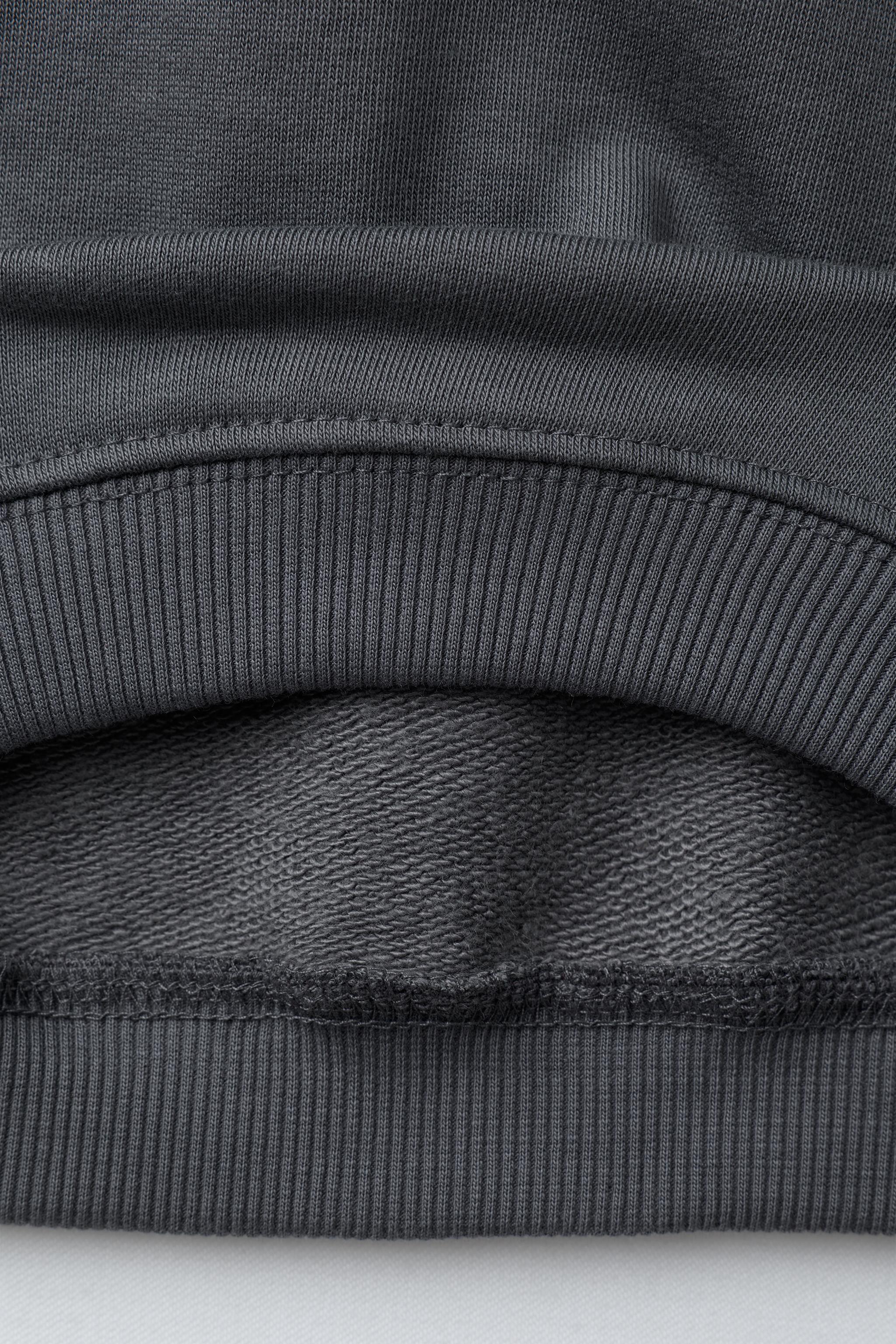 DINOSAUR PRINT SWEATSHIRT