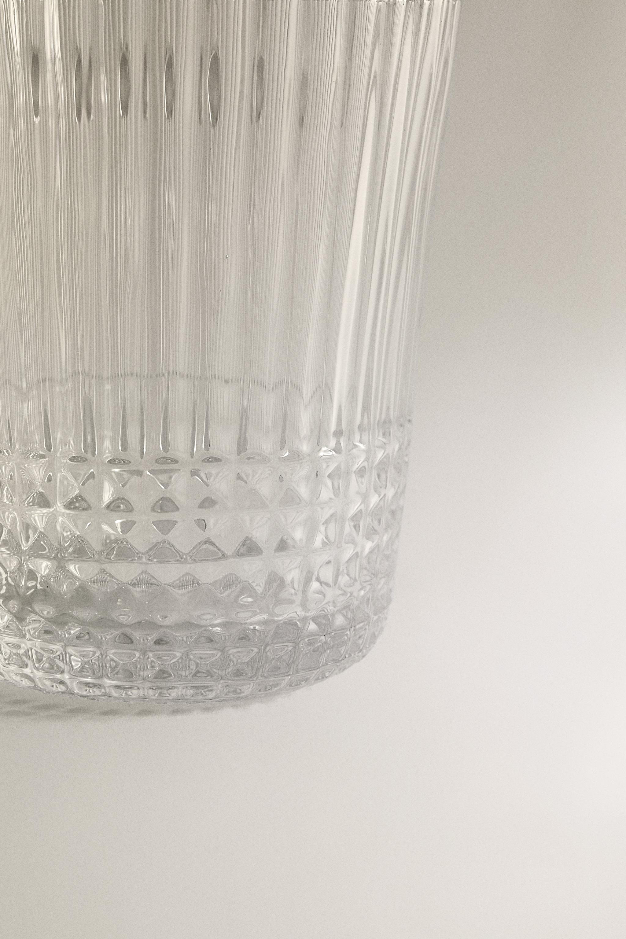 GLASS MUG WITH A RAISED GEOMETRIC DESIGN