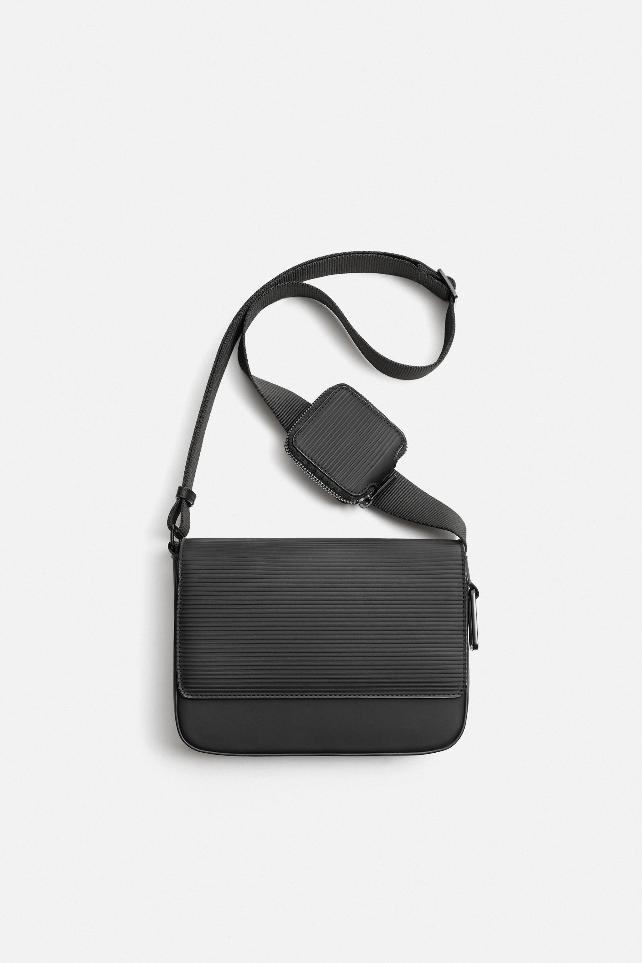 TEXTURED RUBBERIZED CROSSBODY BAG