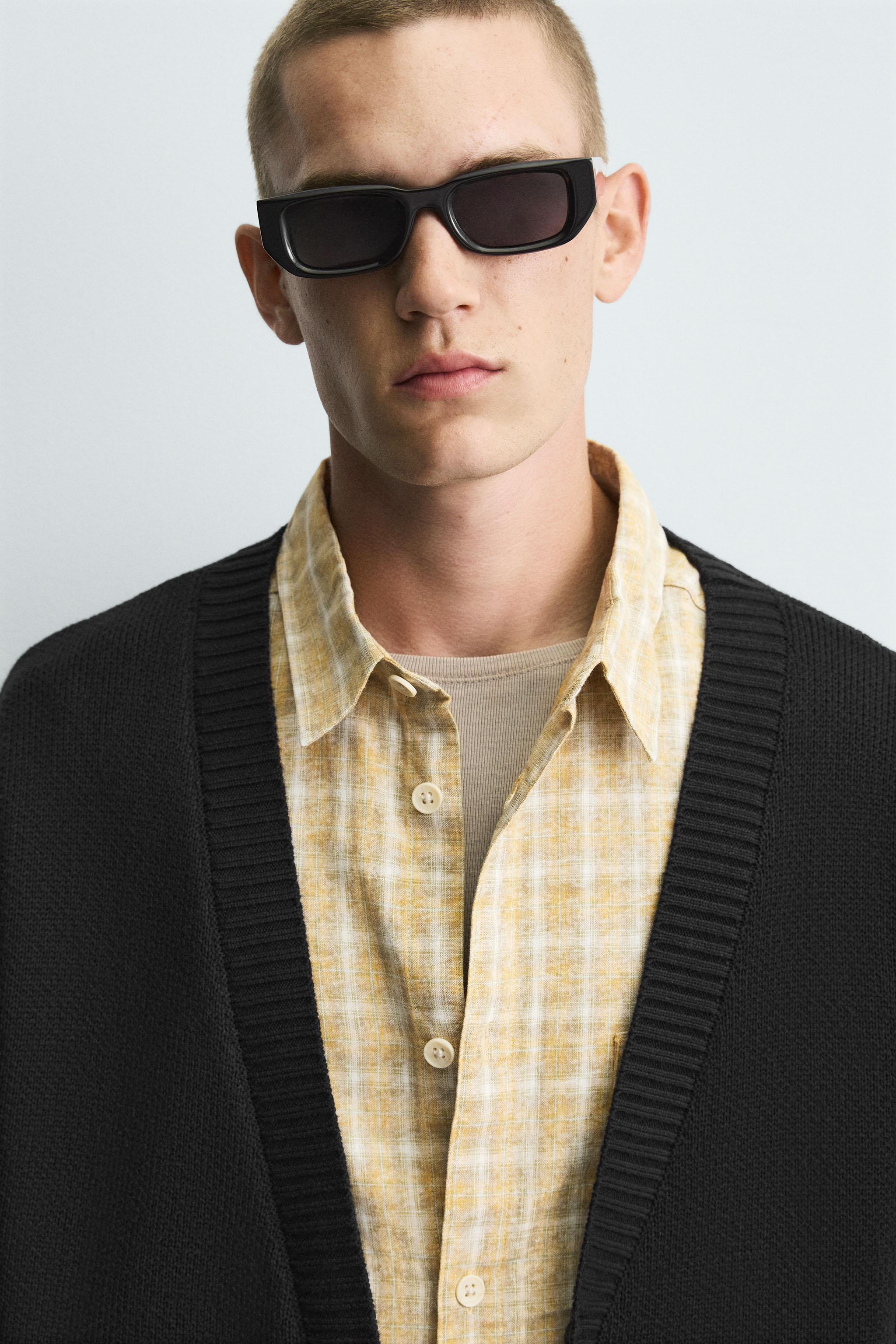 DISTRESSED RIBBED CARDIGAN