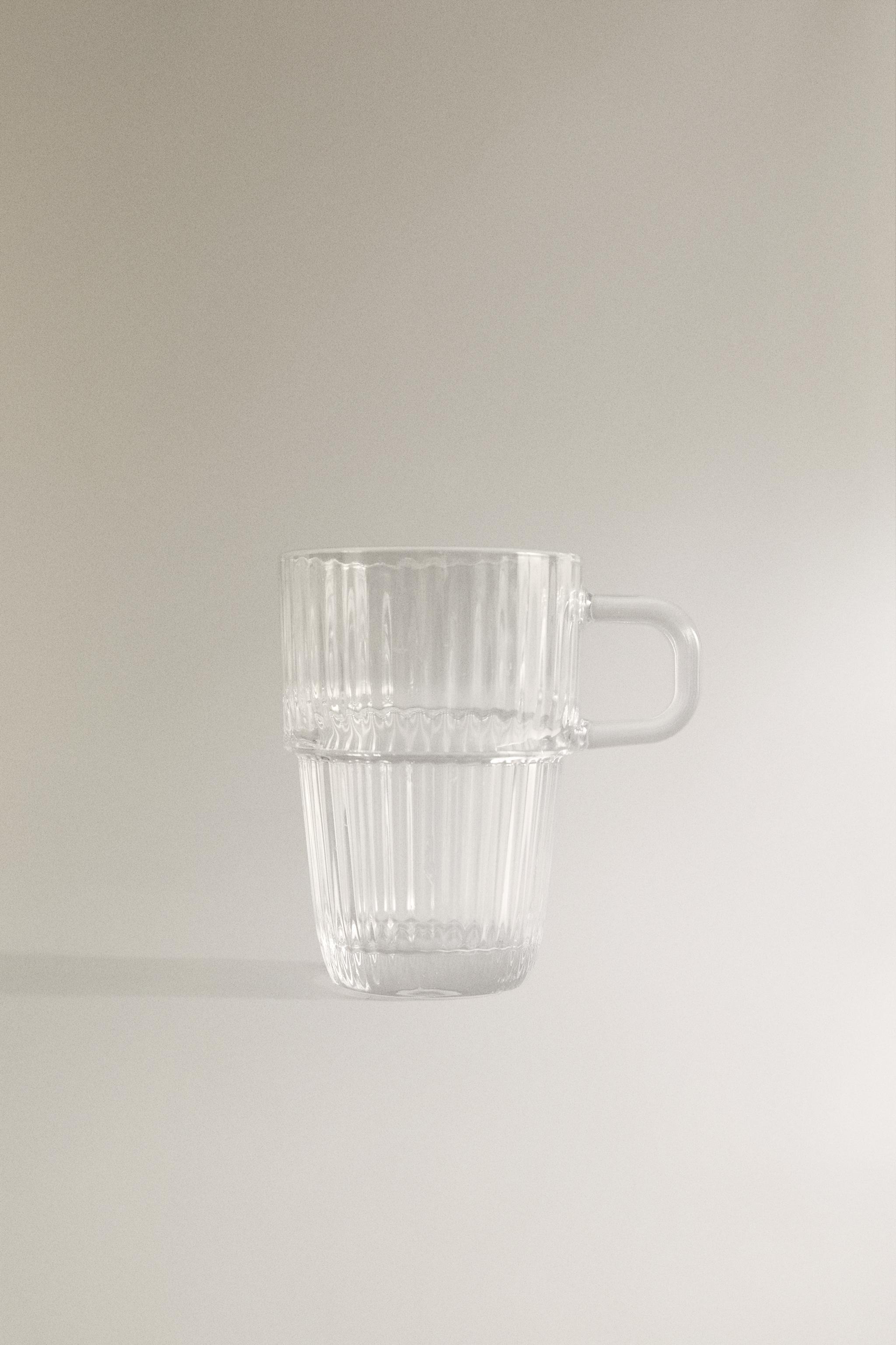 GLASS MUG WITH A RAISED DESIGN