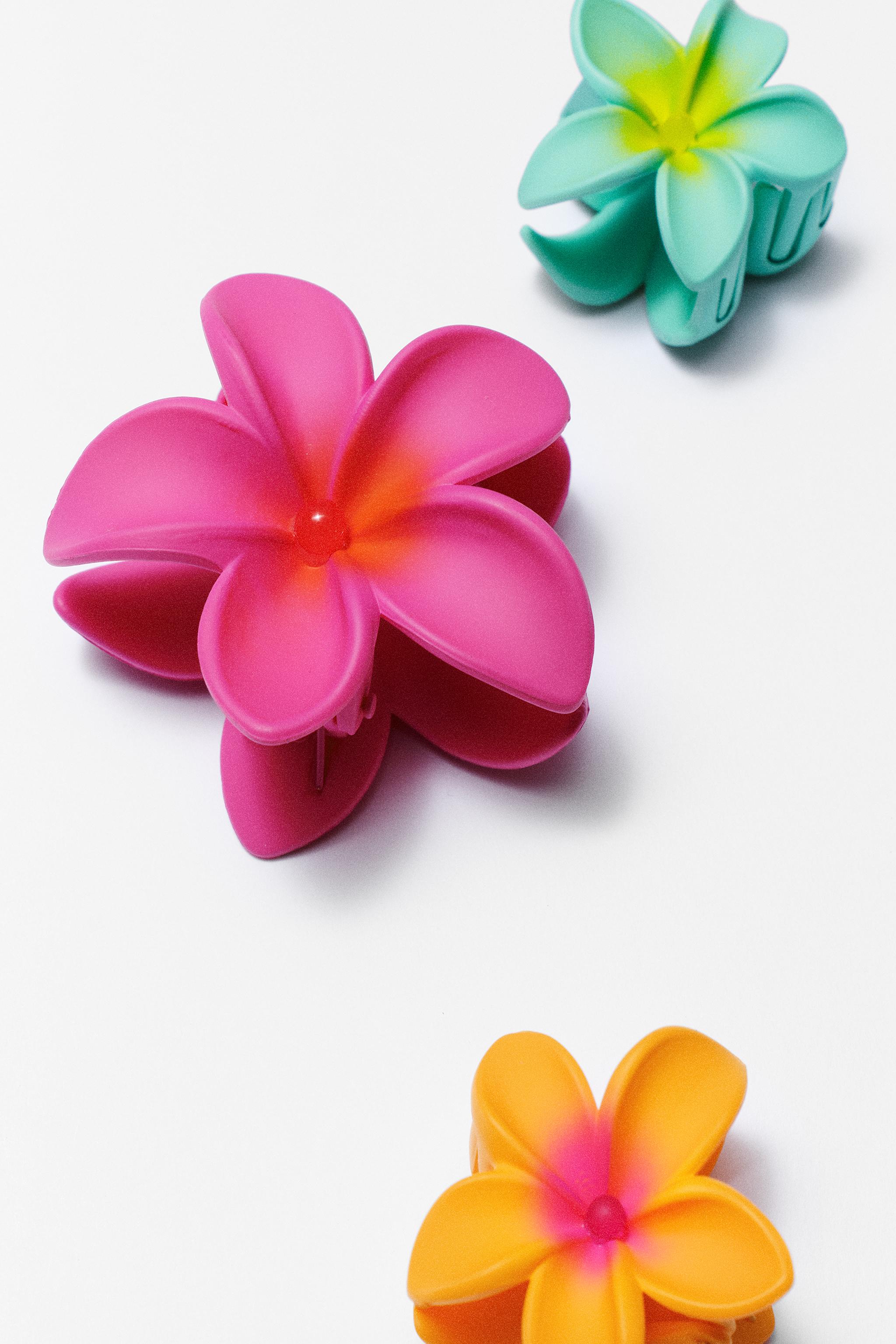 THREE PACK OF FLOWER HAIR CLIPS