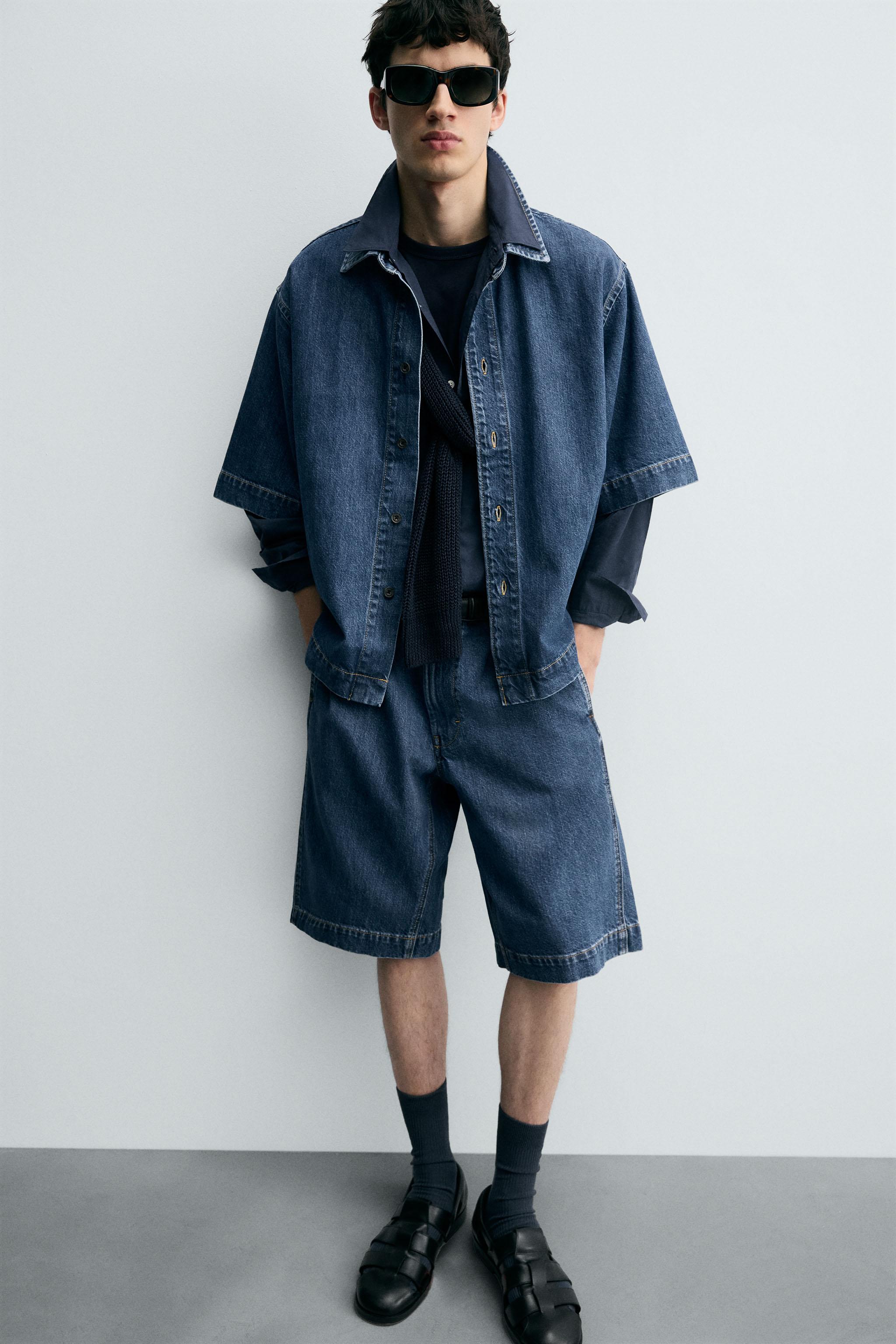 PLEATED RELAXED FIT DENIM SHORTS