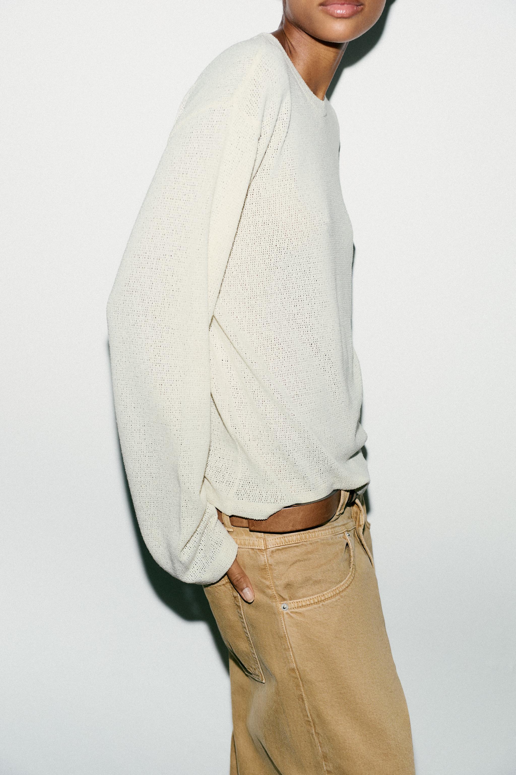 CUT-OUT KNIT SWEATER