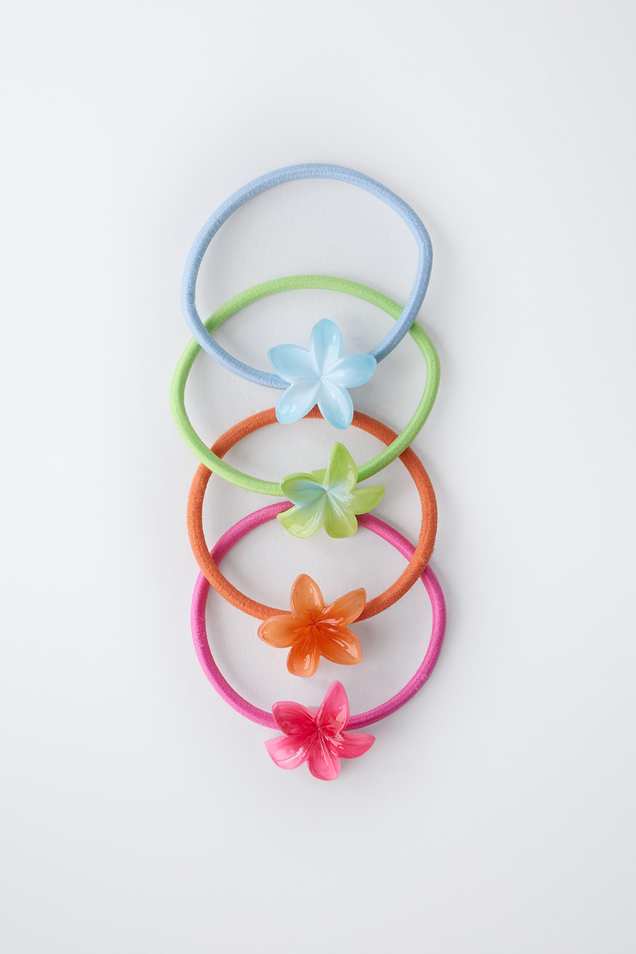 FOUR-PACK OF FLOWER HAIR TIES
