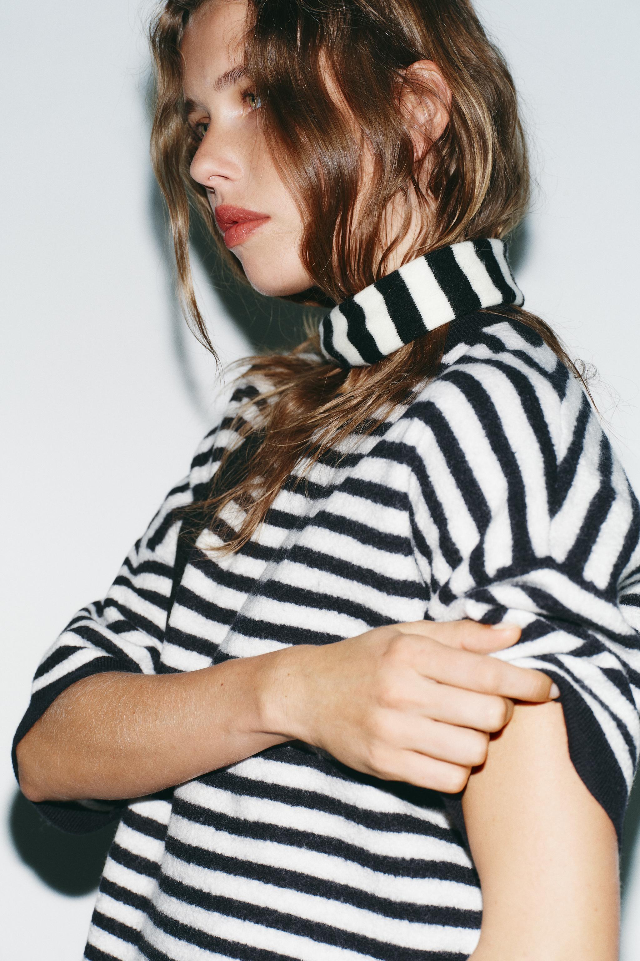 100% WOOL STRIPED SWEATER