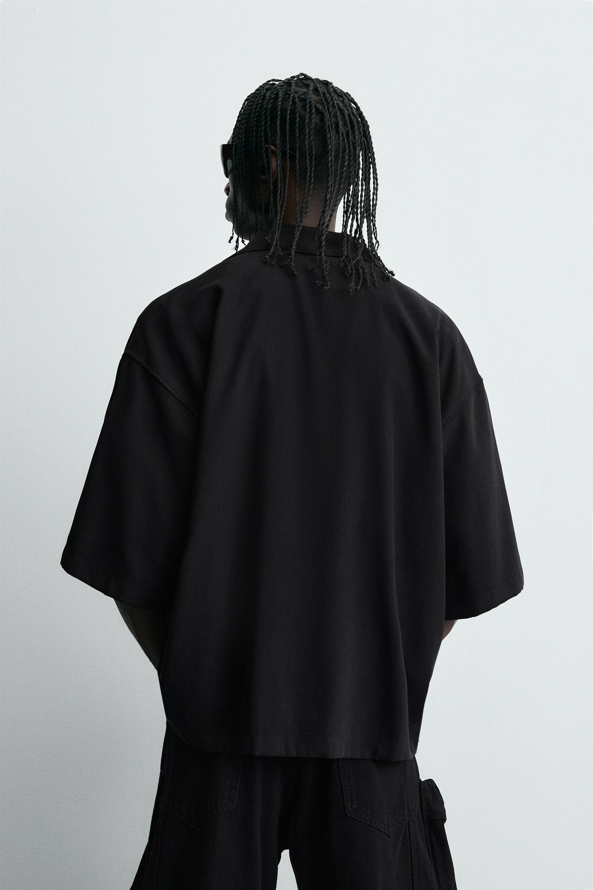 FLOWY SHIRT WITH EMBROIDERED TEXT