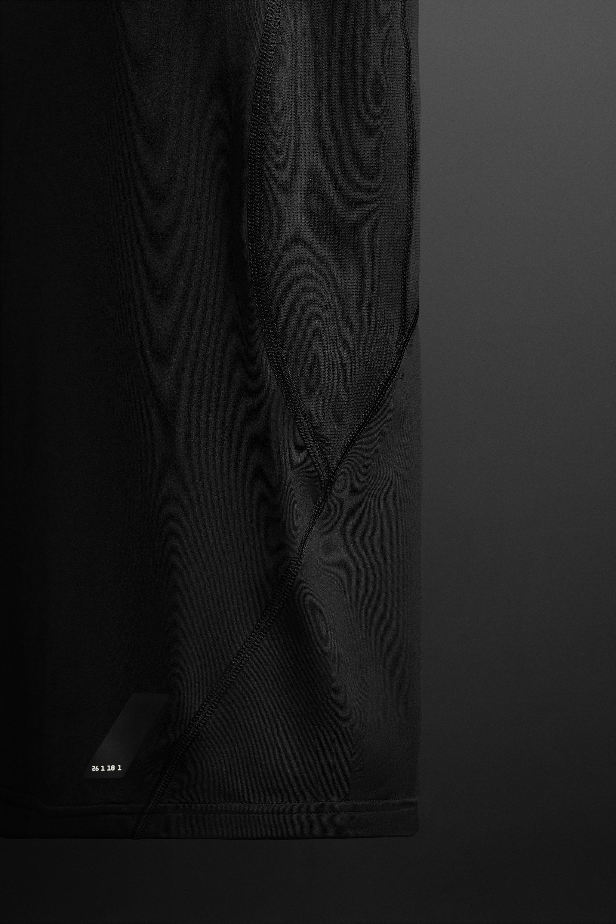 COMPRESSION TANK TOP