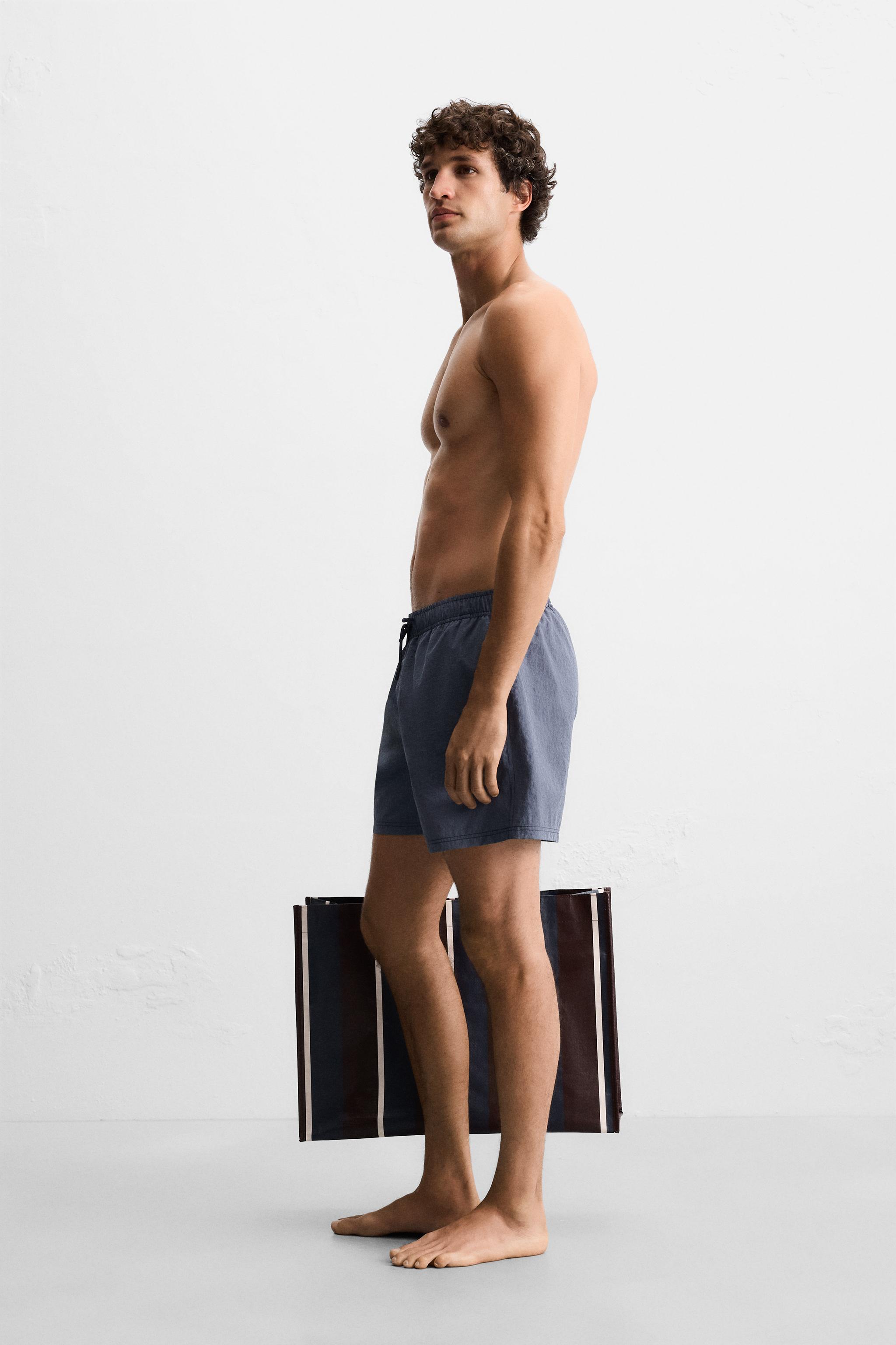 STRIPED MID-LENGTH SWIMSUIT