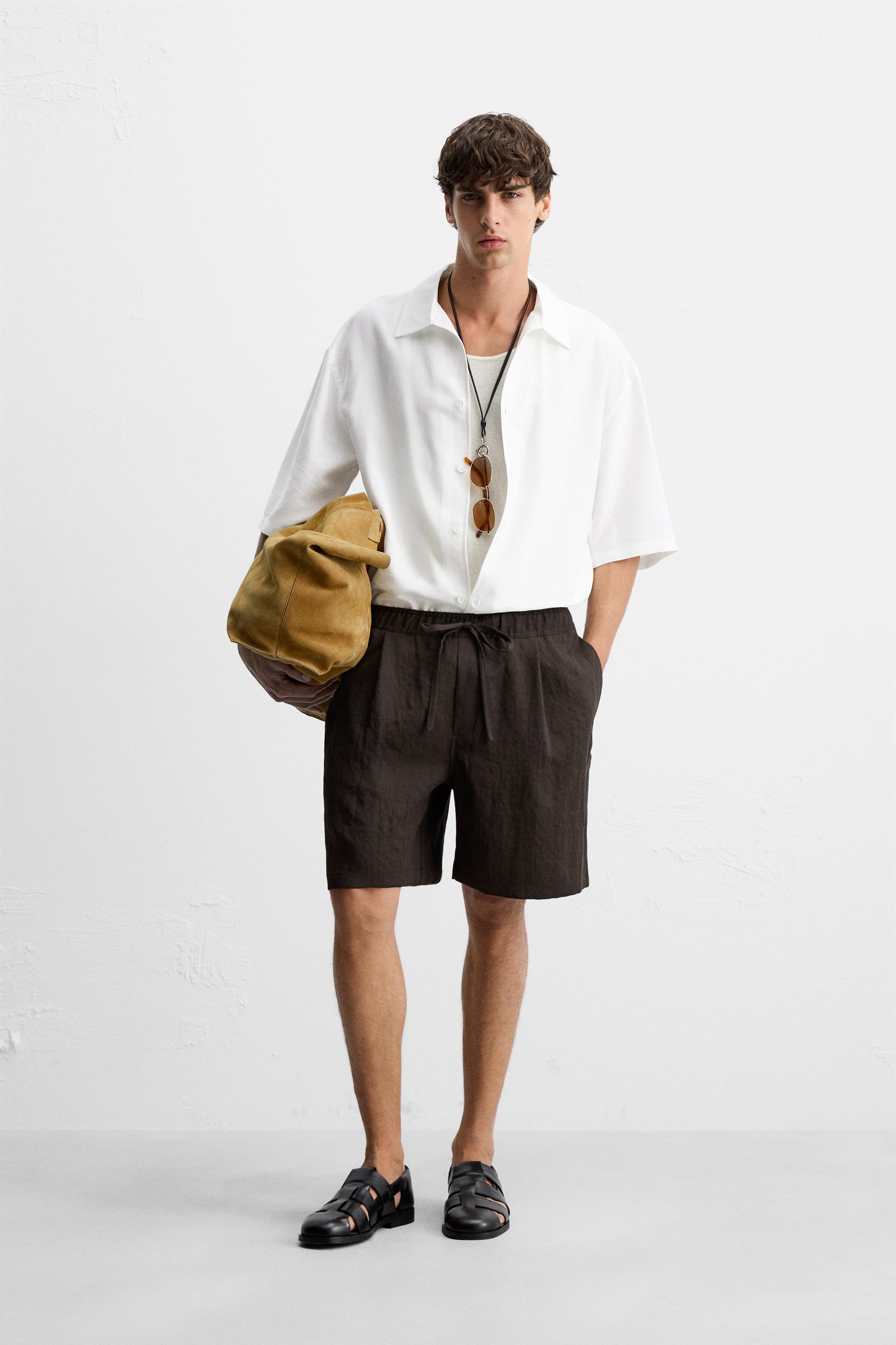 PLEATED FLOWY SHORTS