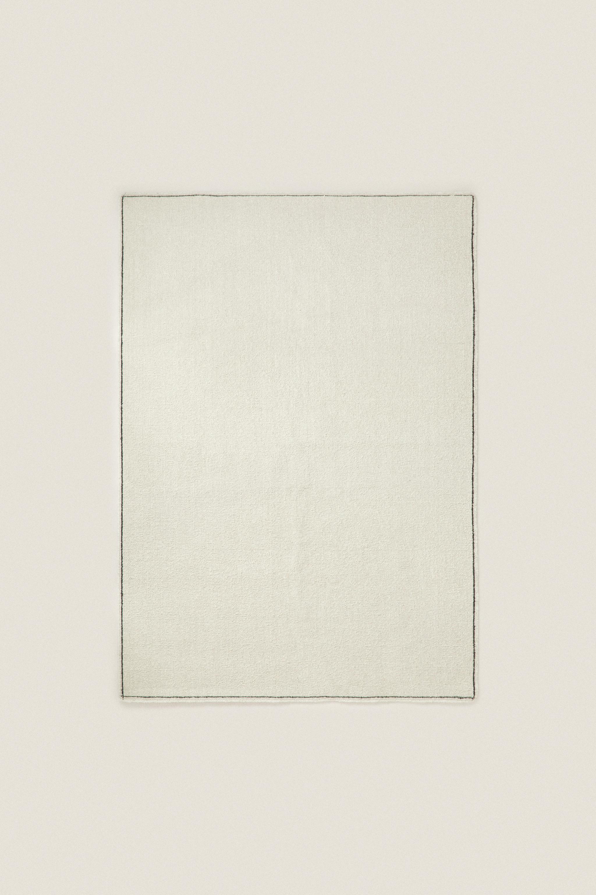 RECTANGULAR BOUCLÉ WOOL AREA RUG