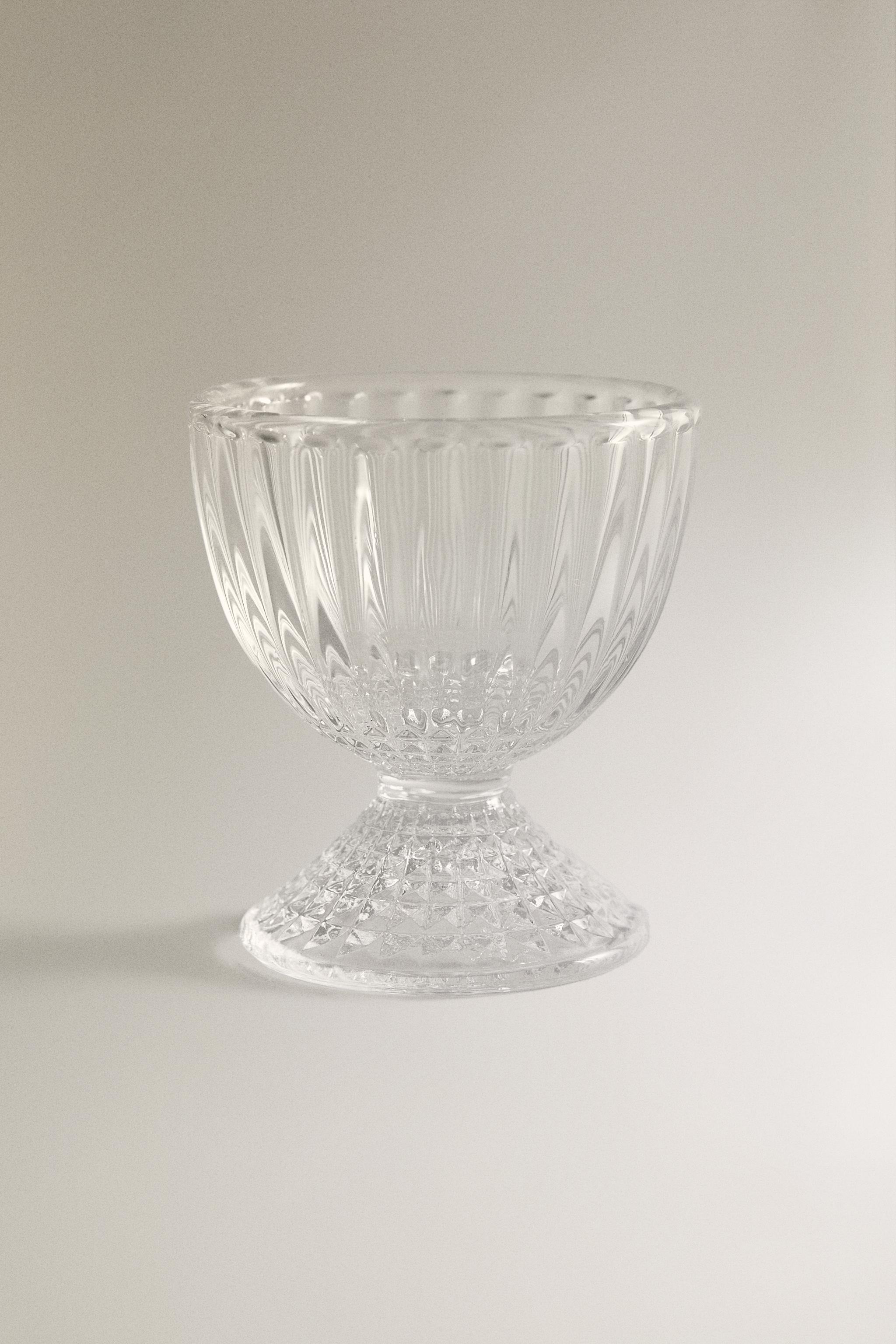 GLASS EGG CUP WITH A RAISED GEOMETRIC DESIGN