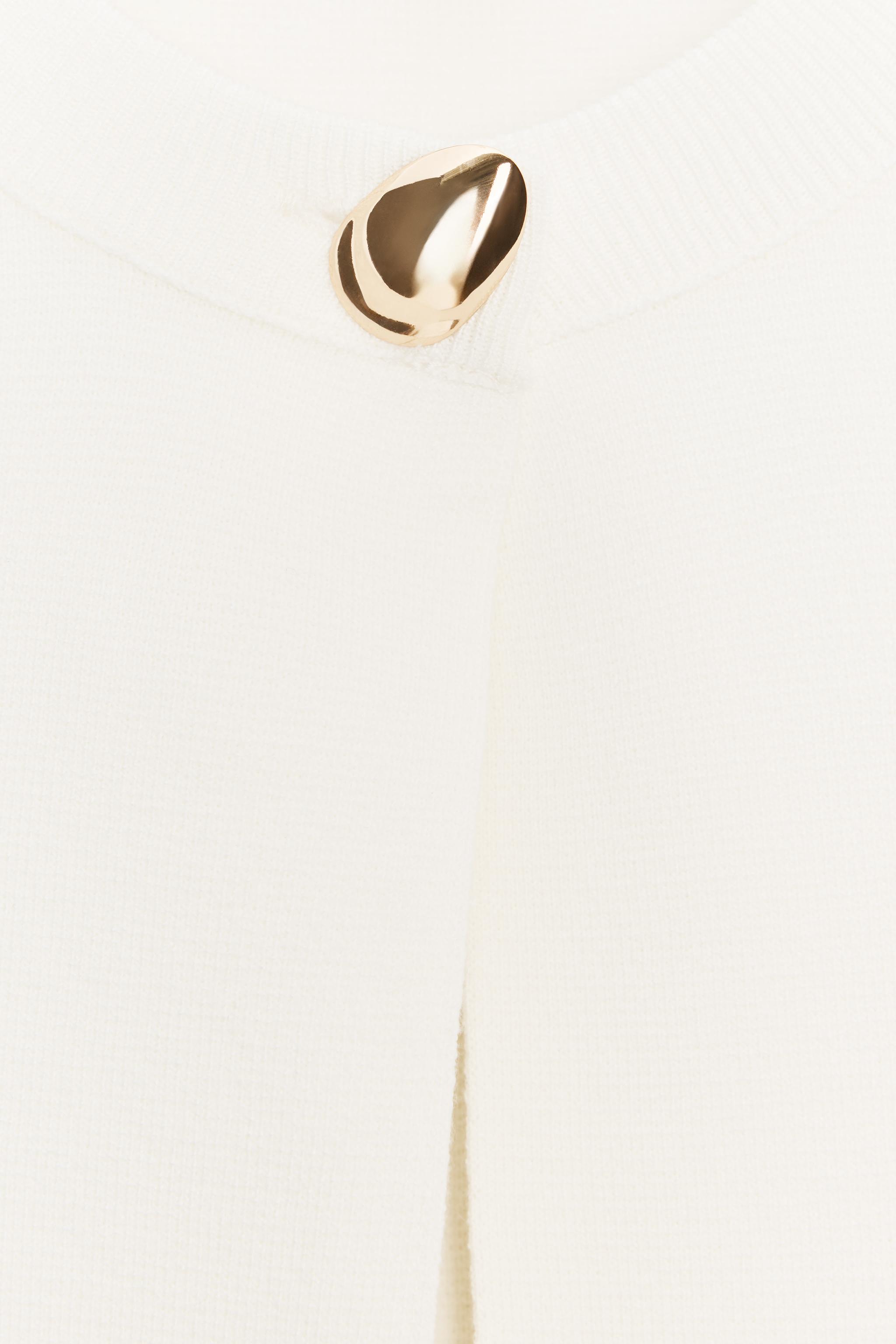 SHORT SLEEVE KNIT CARDIGAN