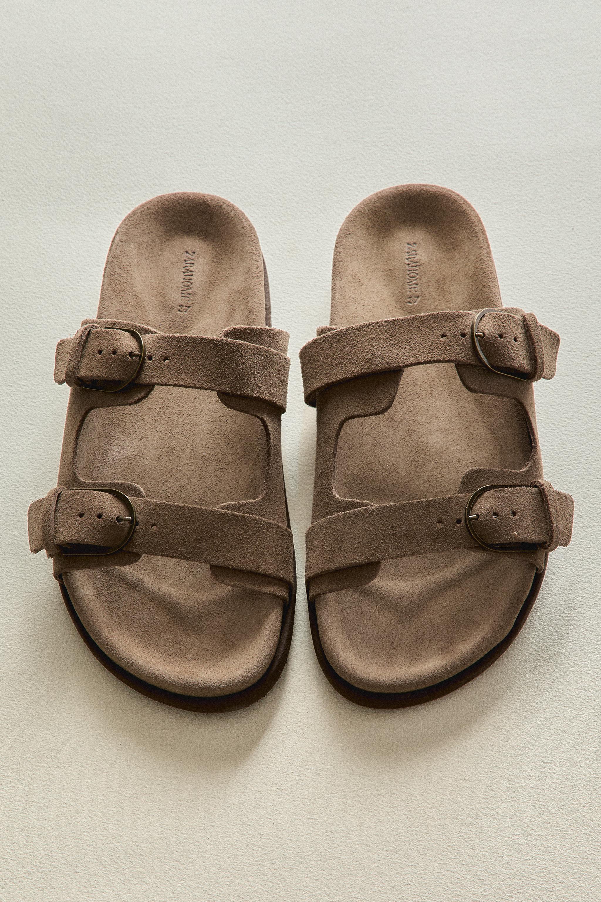 FLAT LEATHER SANDALS WITH BUCKLES