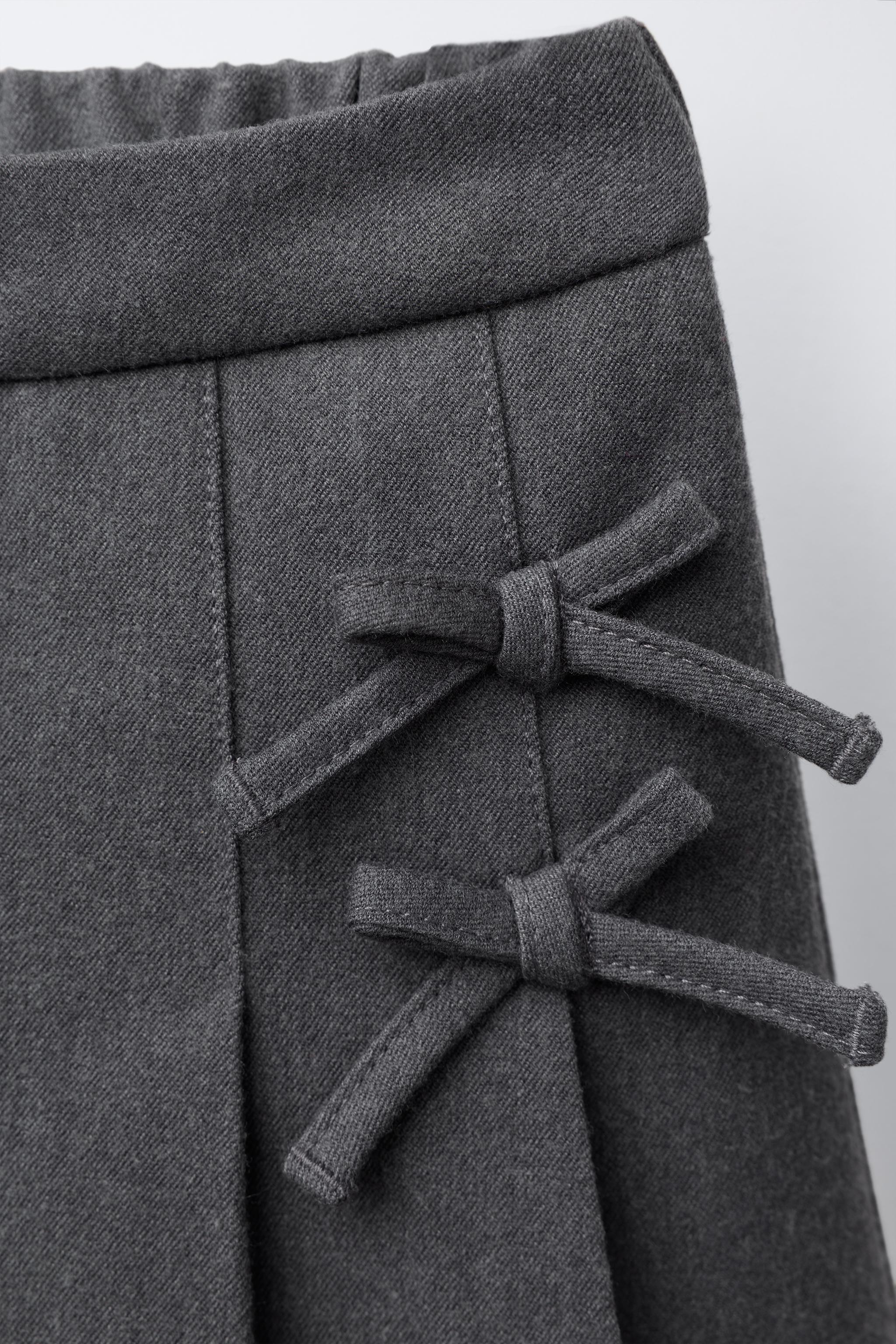 PLEATED BOW SKORT