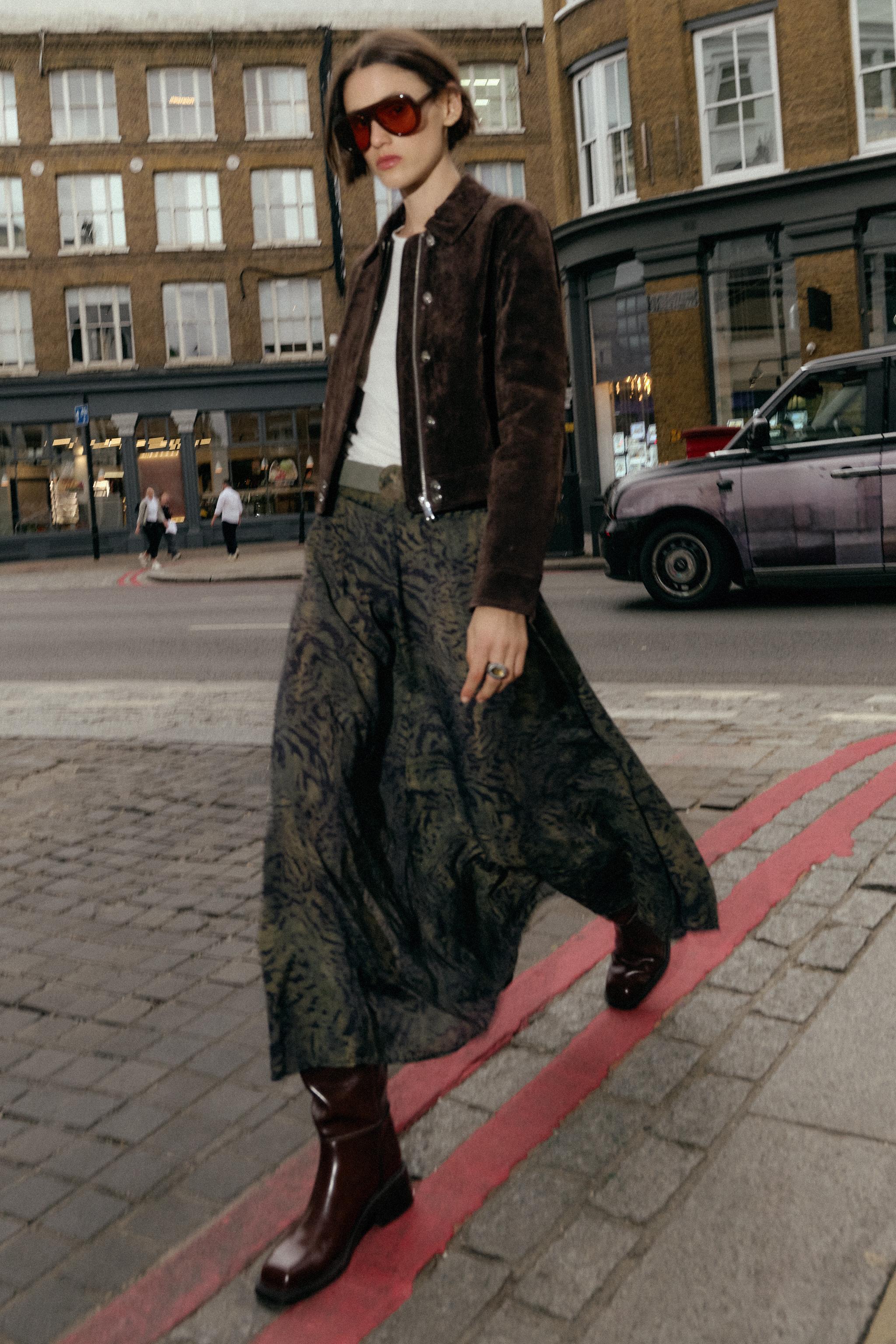 BELTED ANIMAL PRINT MIDI SKIRT