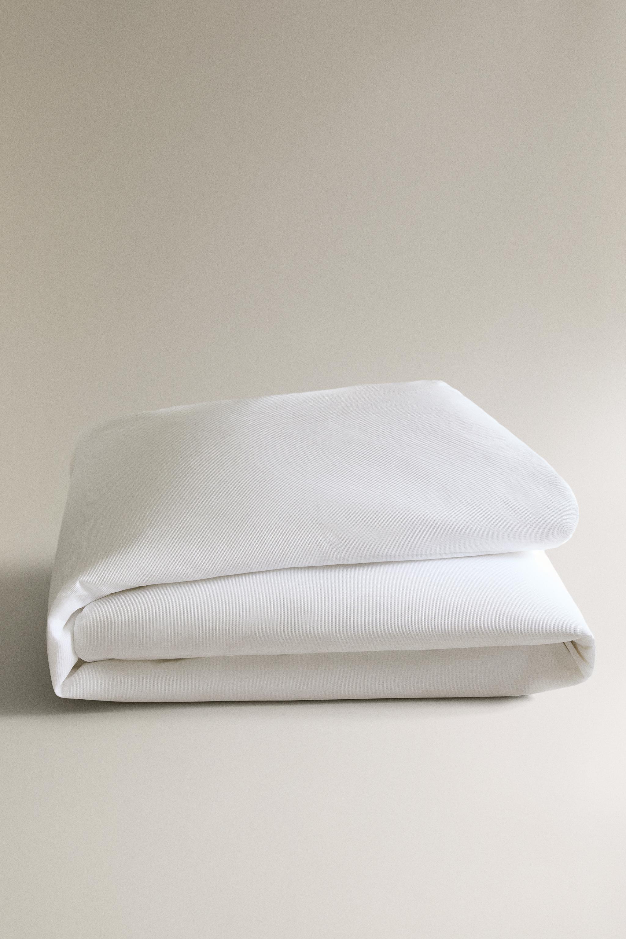 PIQUÉ PIPING DUVET COVER