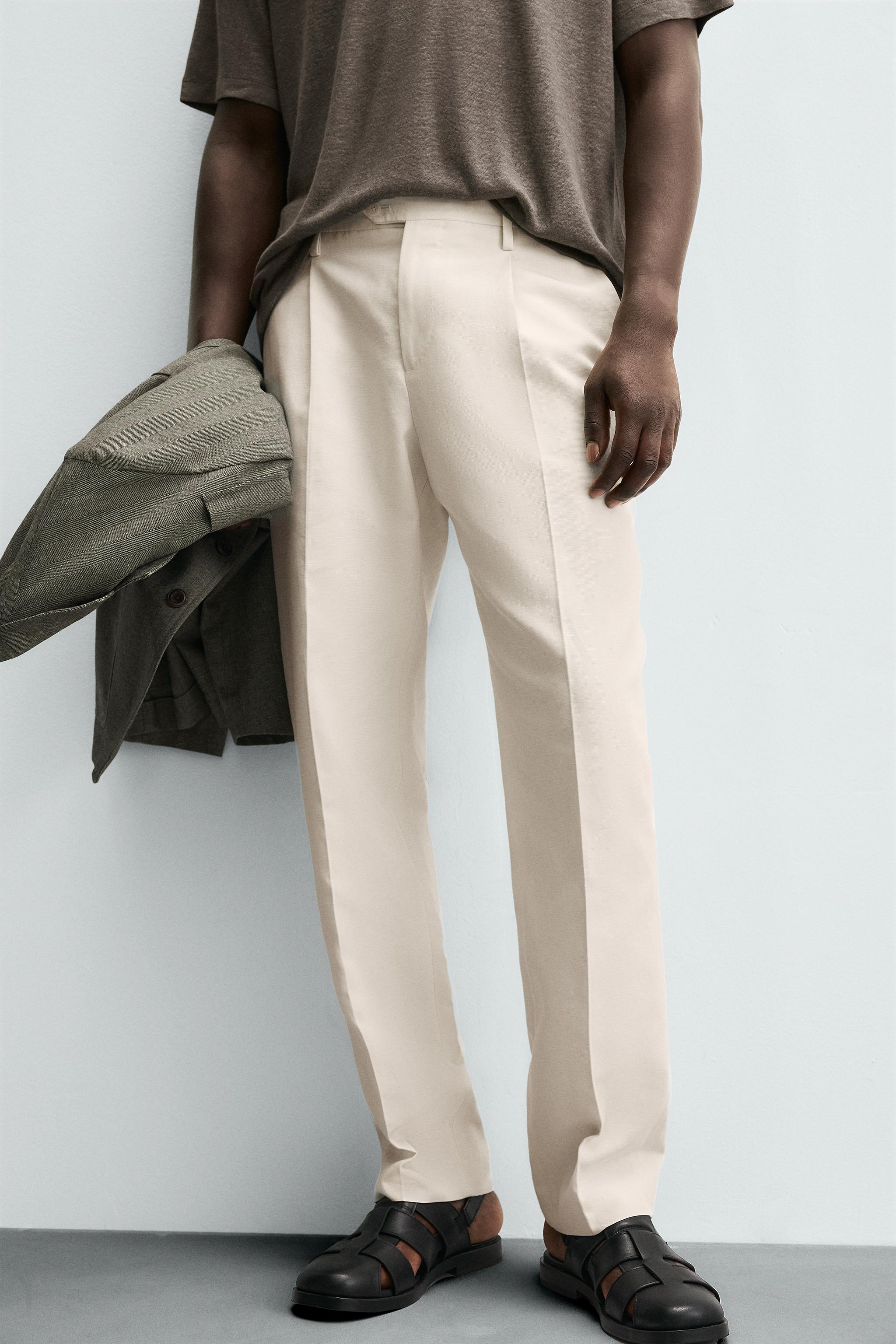 REGULAR FIT PLEATED PANTS