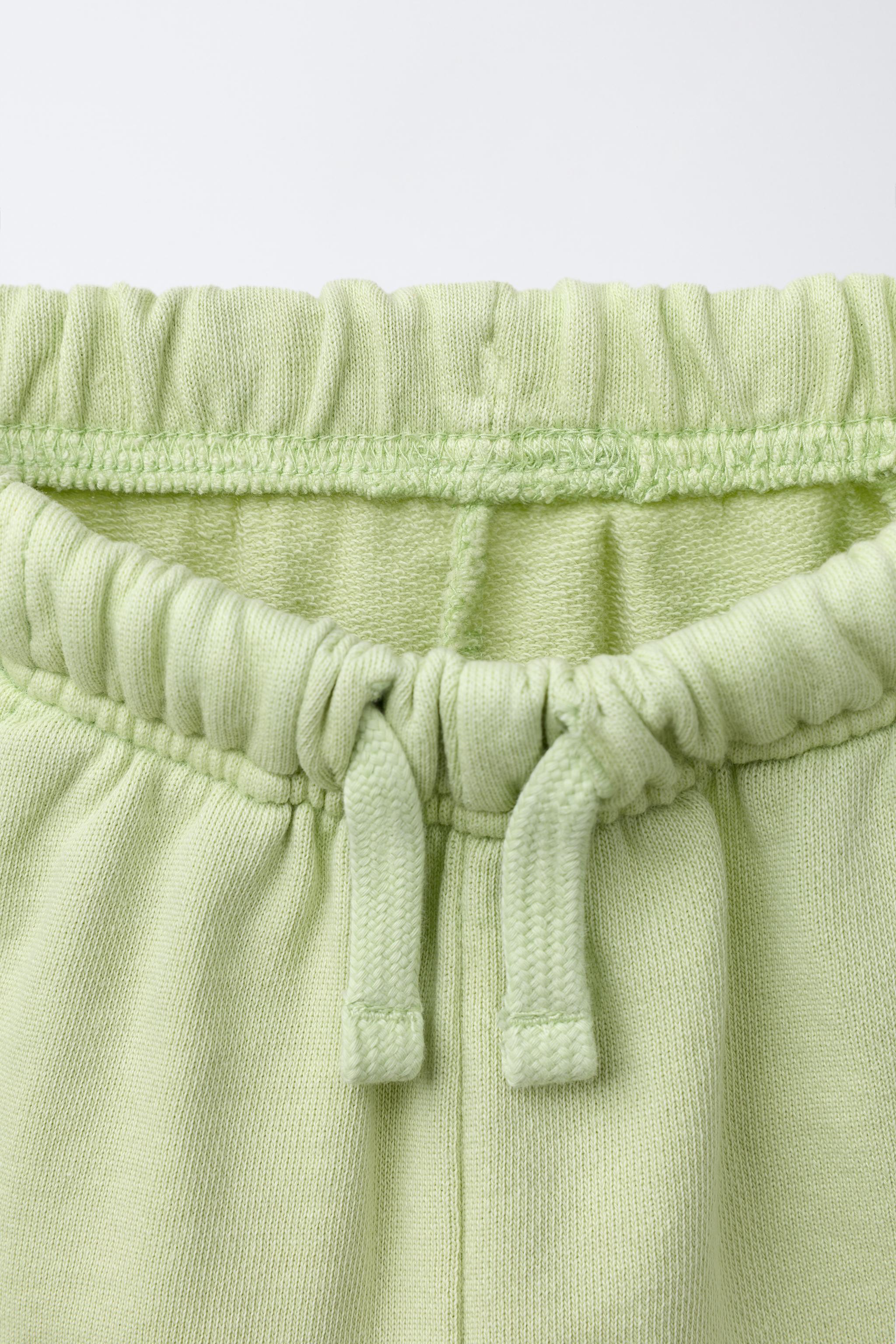 STRAIGHT GARMENT DYE LABEL PLUSH SHORTS