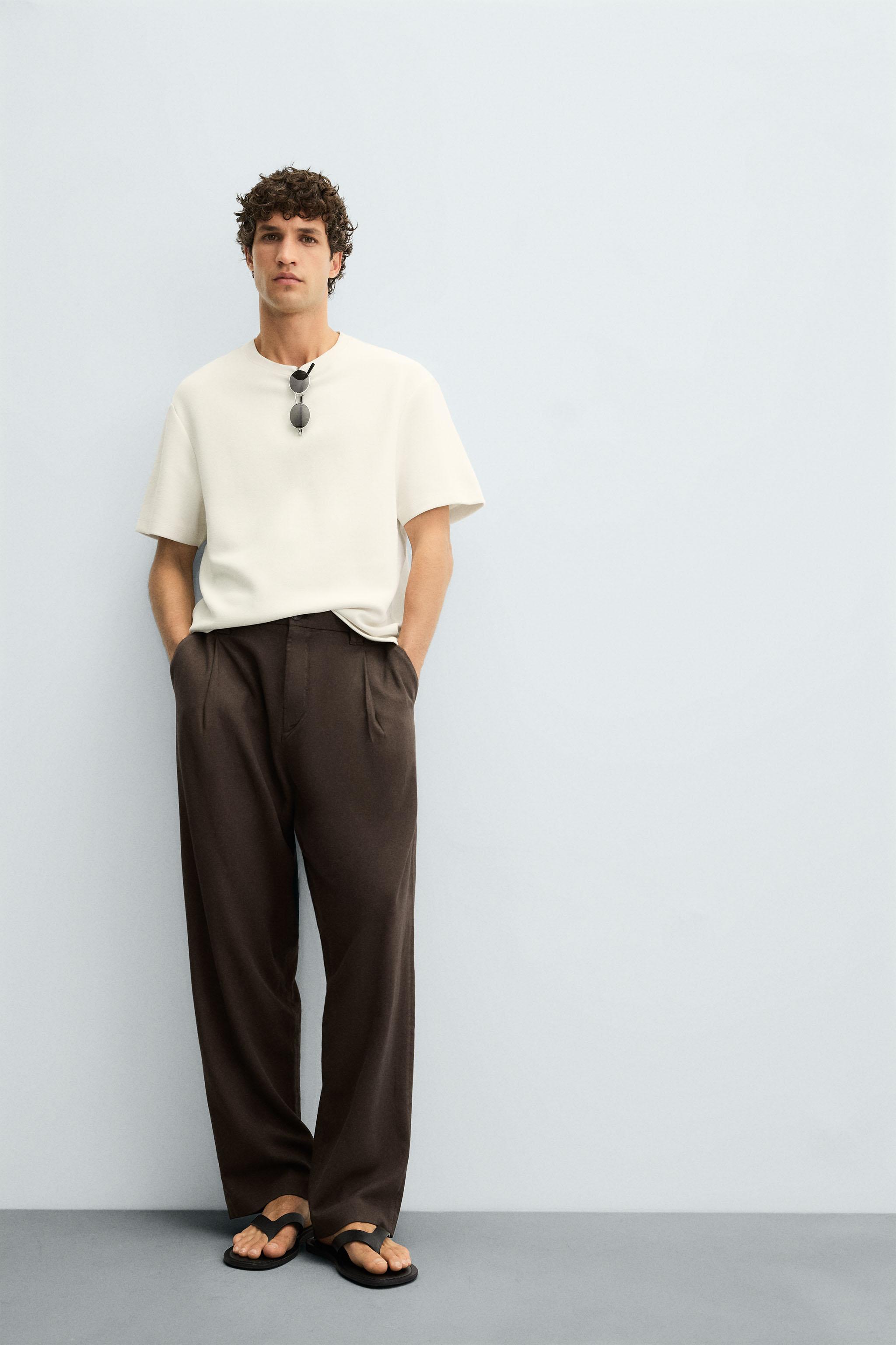 FLOWY PLEATED PANTS