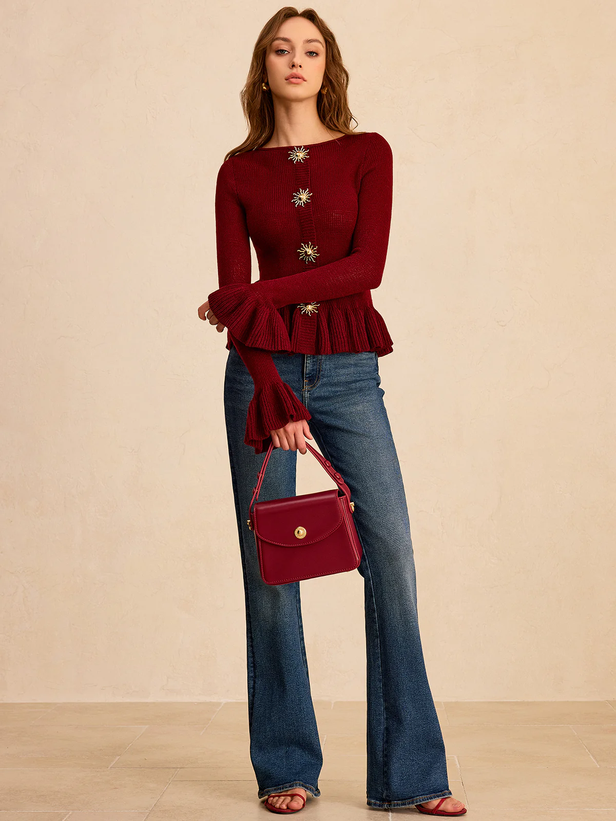 Metal Detail Ruffled Hem Knit Top