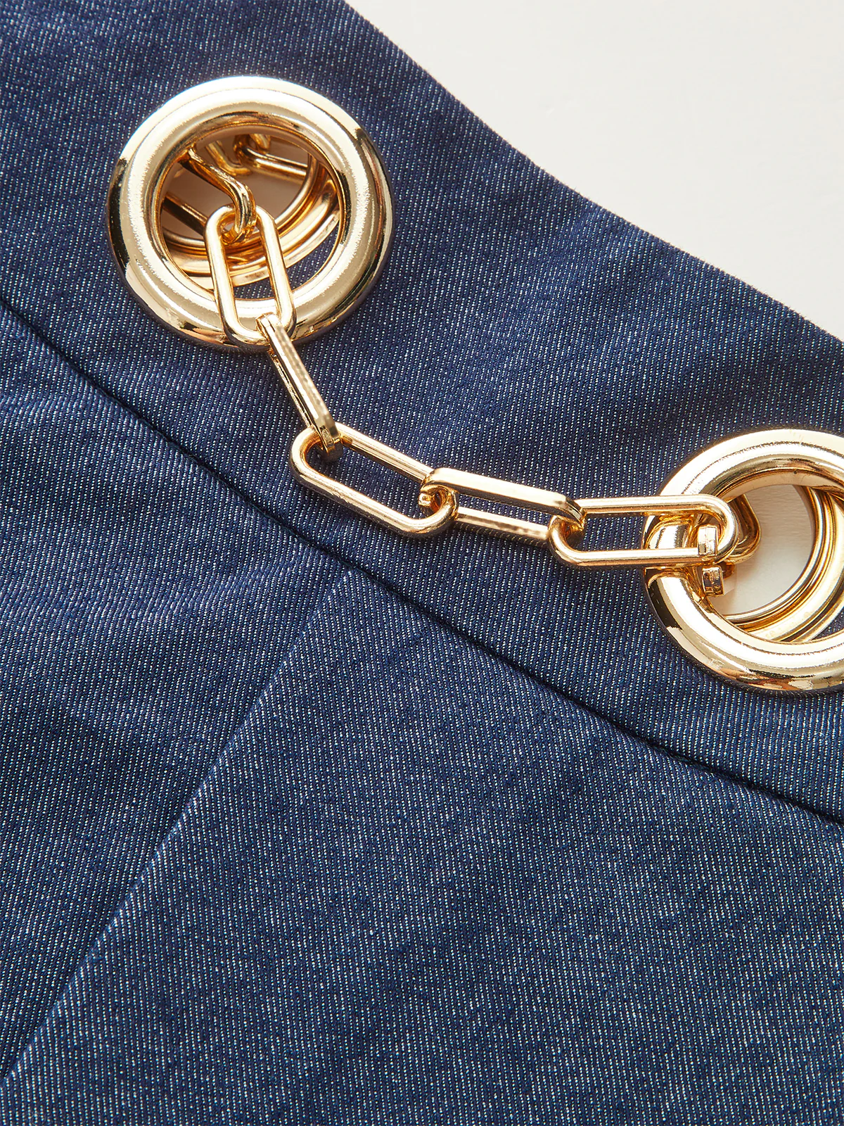 Faux Denim Shorts with Metal Chain Belt