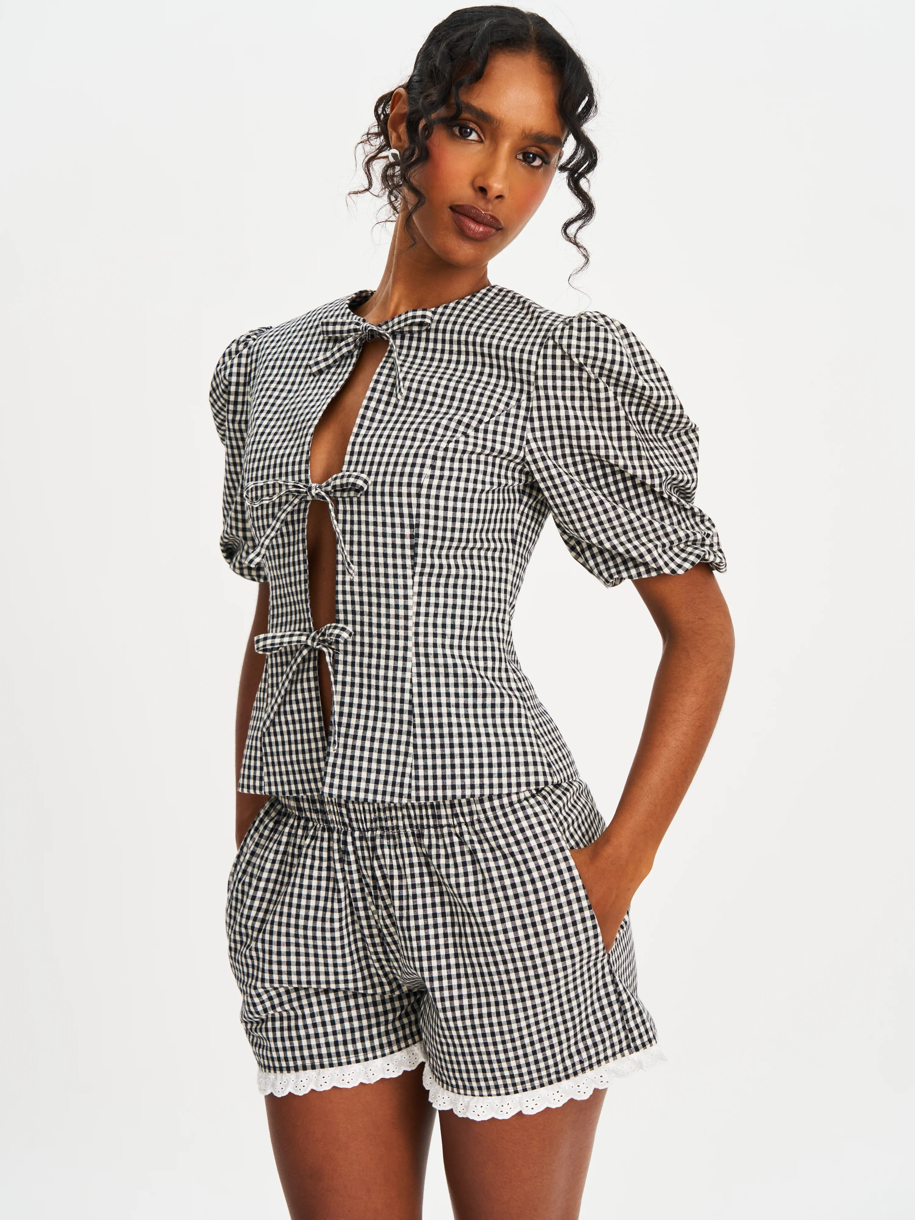 Qusayla Black Gingham Bubble Sleeve Bowtie Top