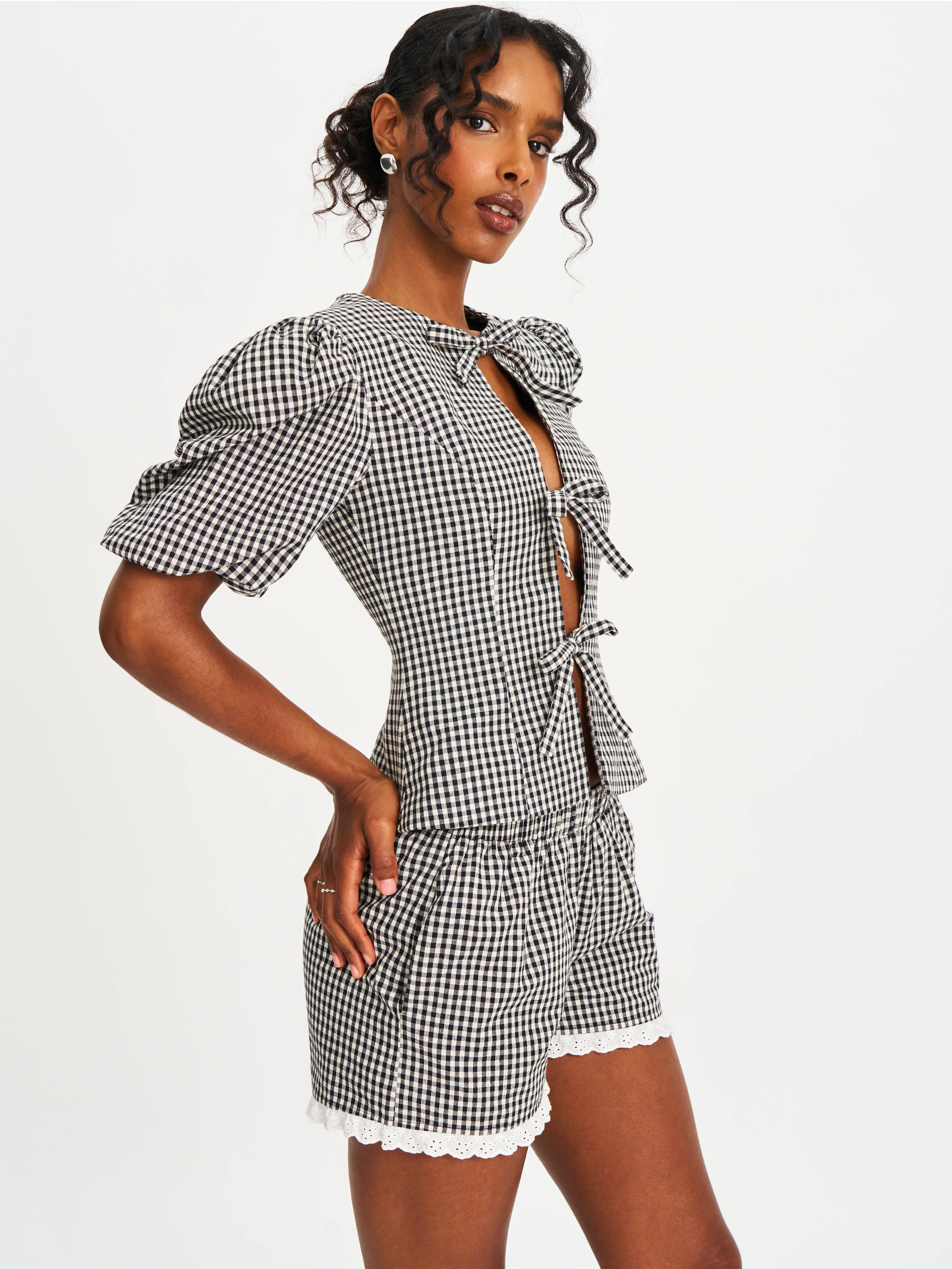 Qusayla Black Gingham Bubble Sleeve Bowtie Top
