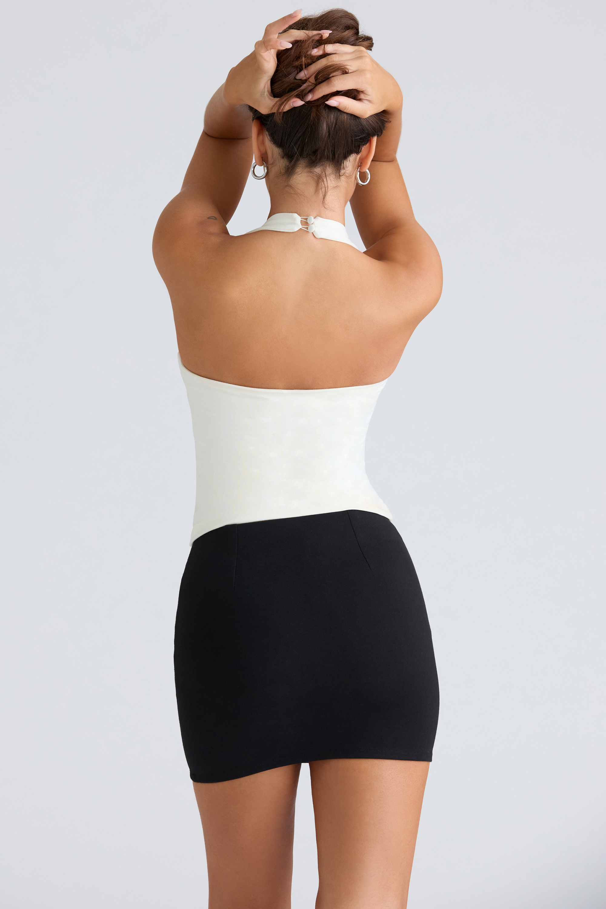 The Peekaboo Ivory Halter Neck Corset Top - luluinthesky
