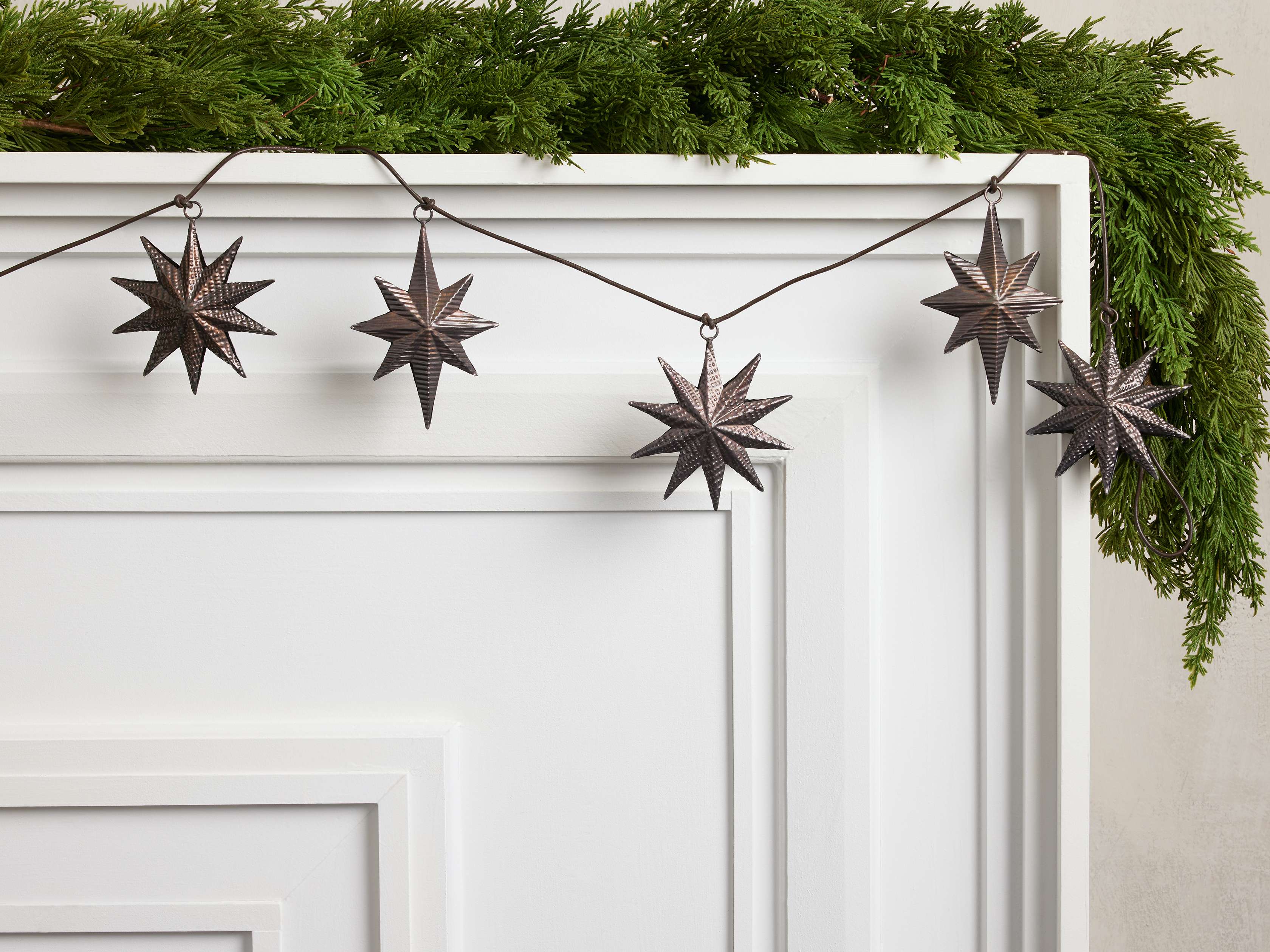 Embossed Star Garland in Dark Bronze