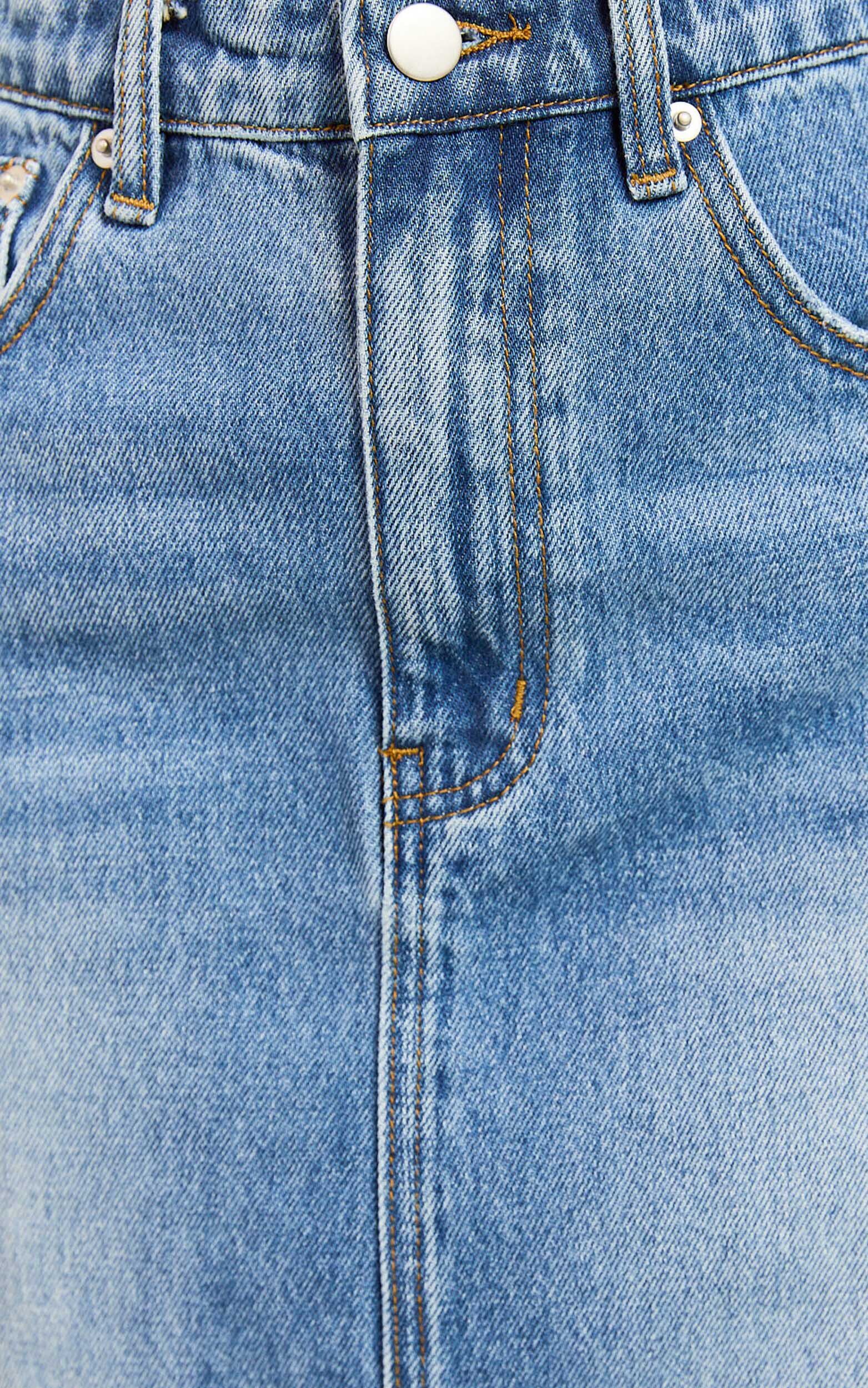 Adan Mini Skirt - Recycled Cotton Frayed Hem Denim Skirt in Mid Blue Wash