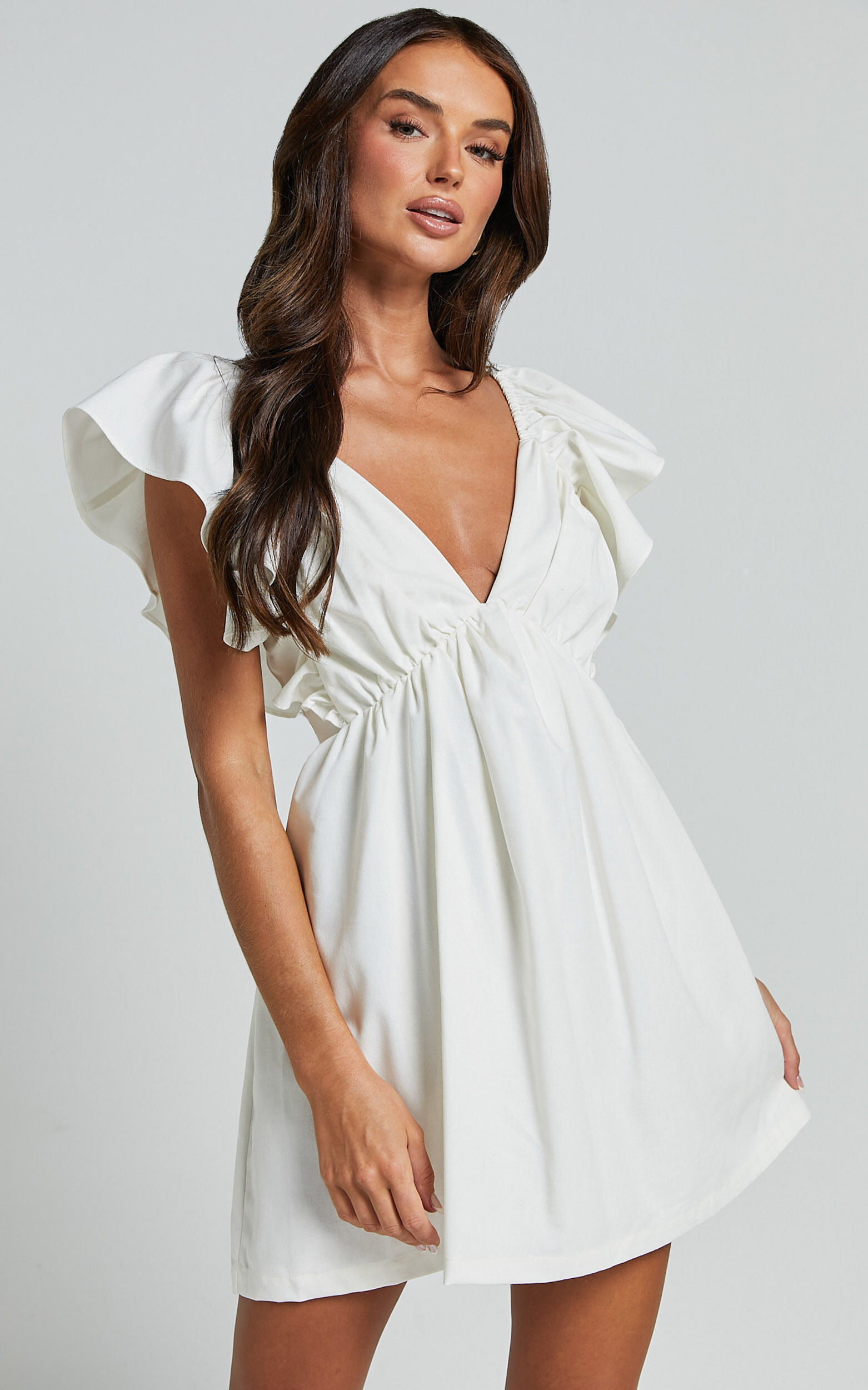 Raiza Mini Dress - Ruffle Sleeve Tie Back Plunge Dress in Off White