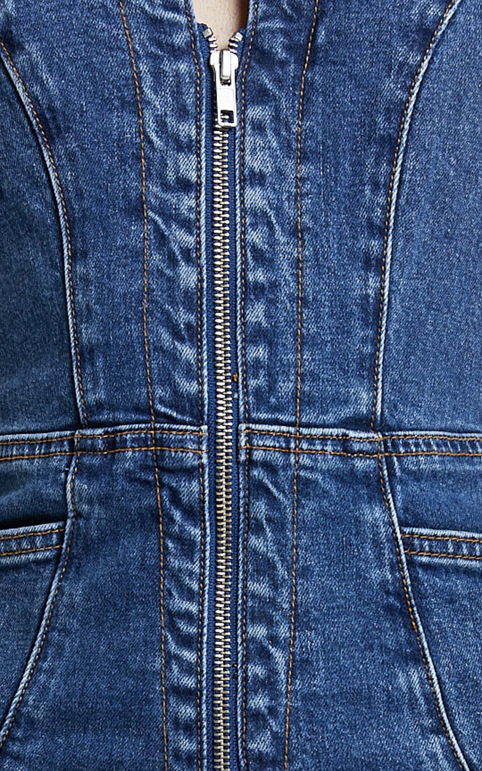 Casidy Jumpsuit - Zip Front Collared Halter Neck Denim in Mid Blue Wash