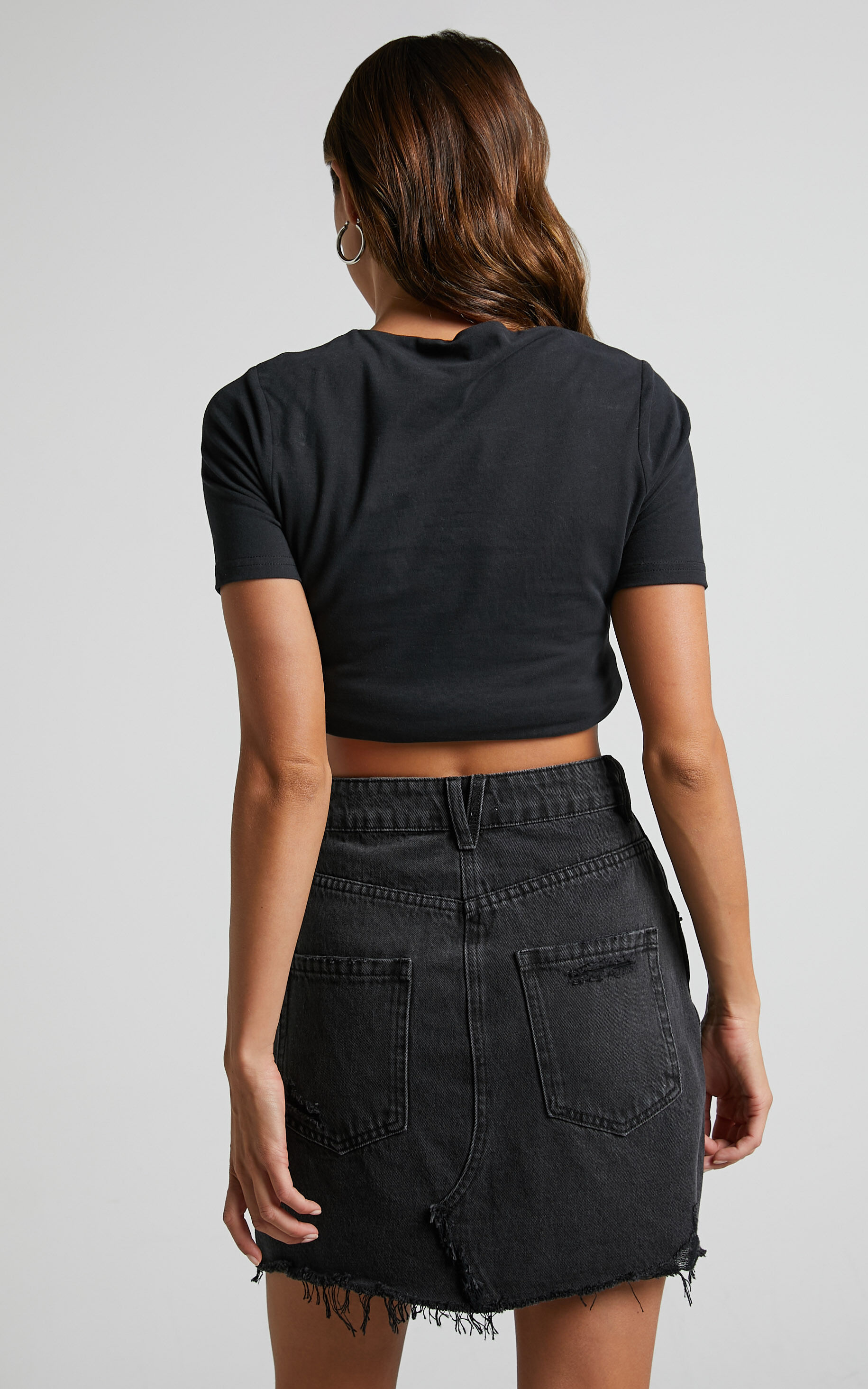 Pieta Mini Skirt - Recycled Cotton Raw Hem Denim Skirt in Washed Black