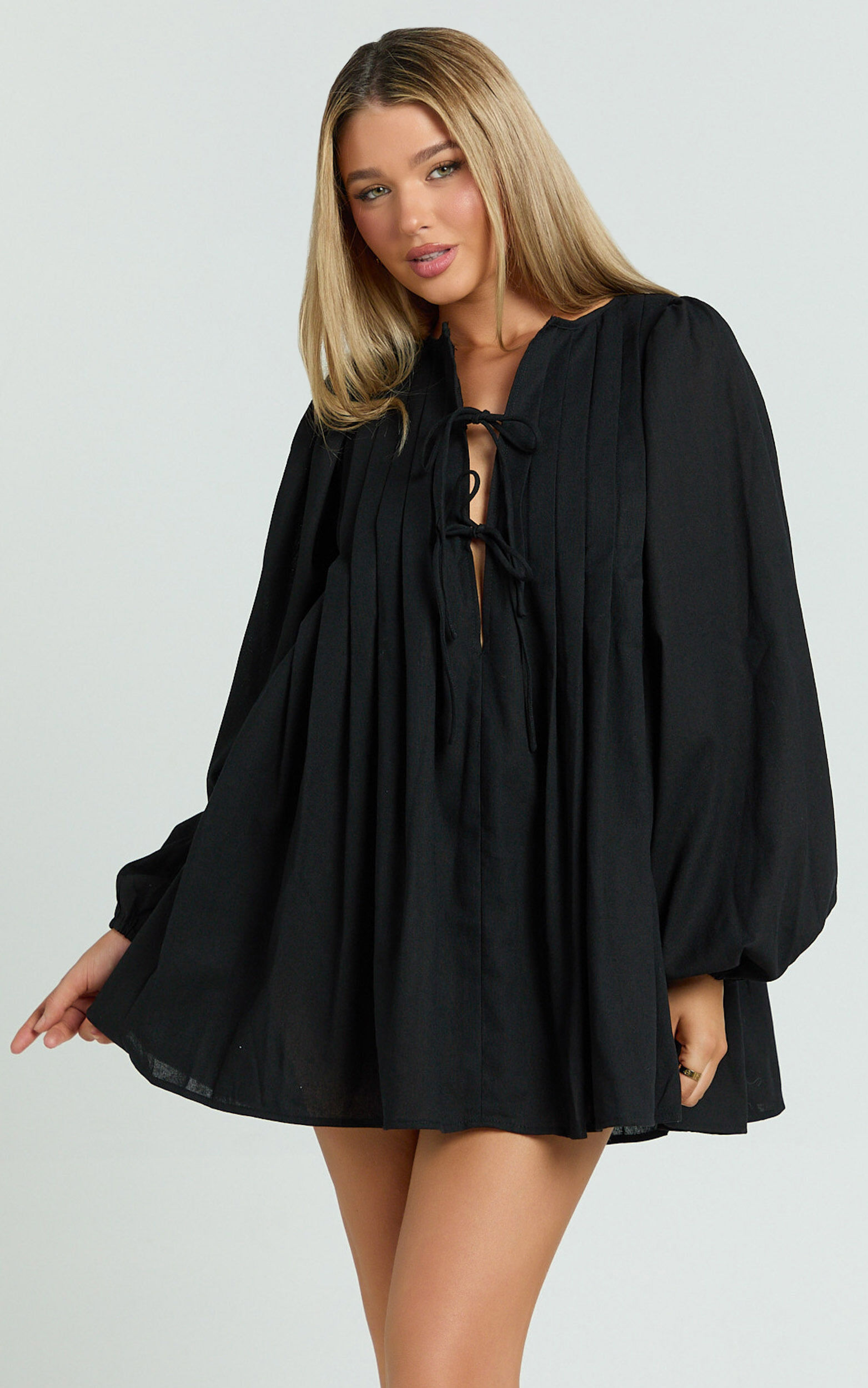 Suzette Mini Dress - High Neck Tie Front Long Sleeve Pleat Front Babydoll Dress in Black