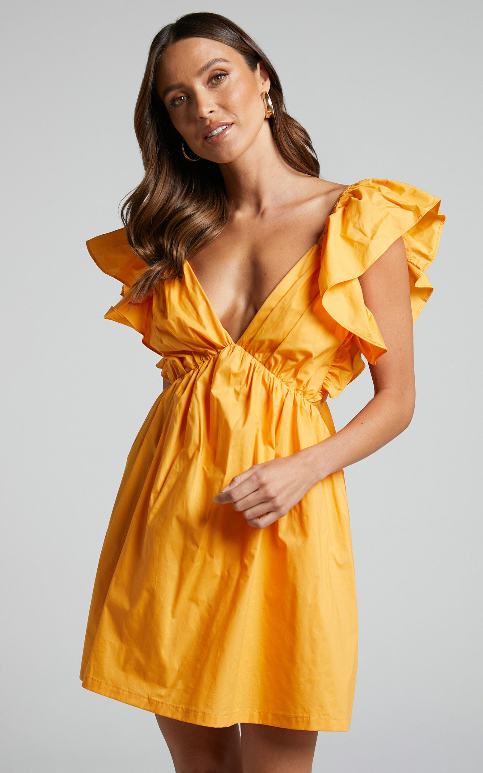 Raiza Mini Dress - Ruffle Sleeve Tie Back Plunge Dress in Marigold