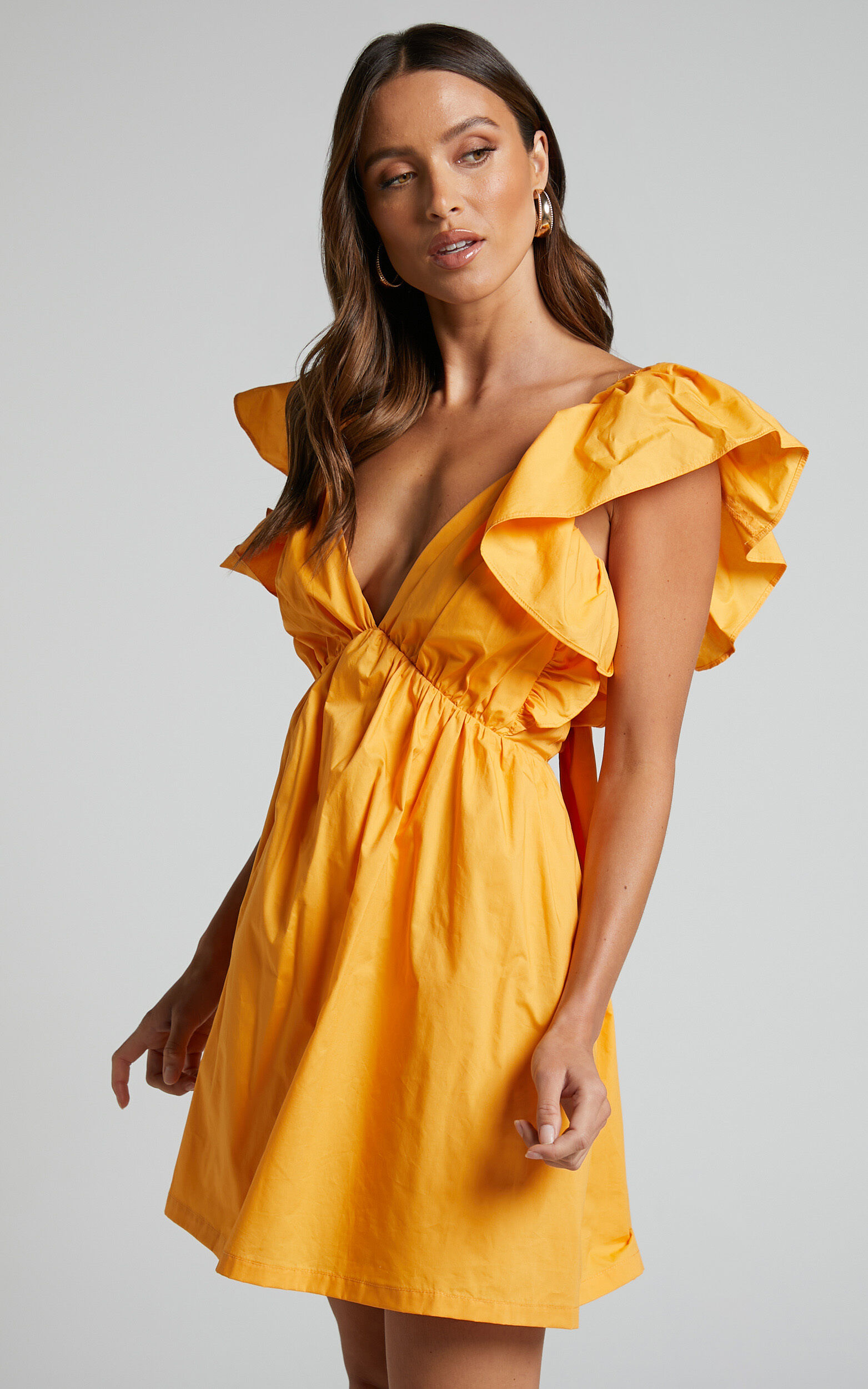 Raiza Mini Dress - Ruffle Sleeve Tie Back Plunge Dress in Marigold