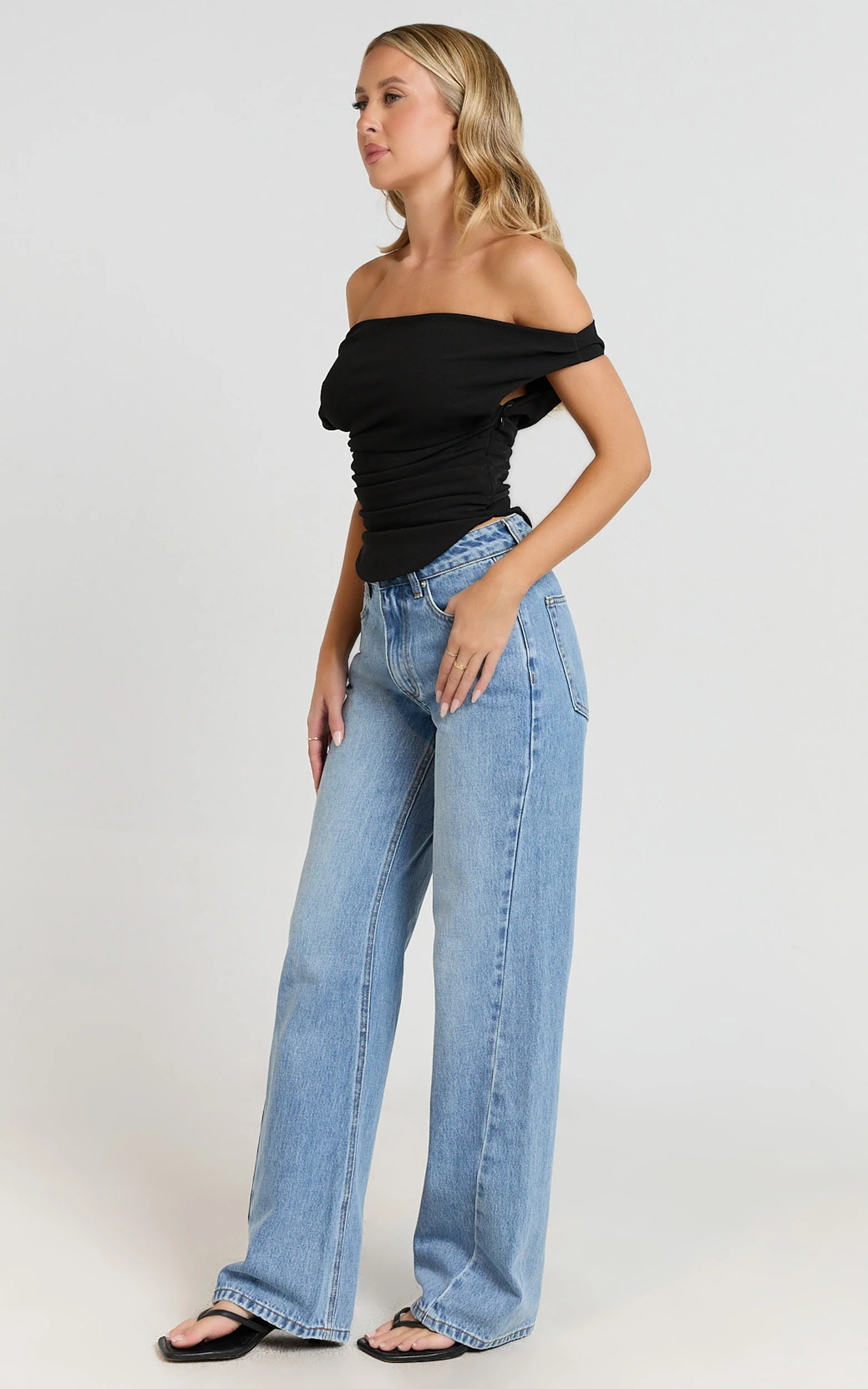 Cleo Top - Off Shoulder Curved Hem Top in Black